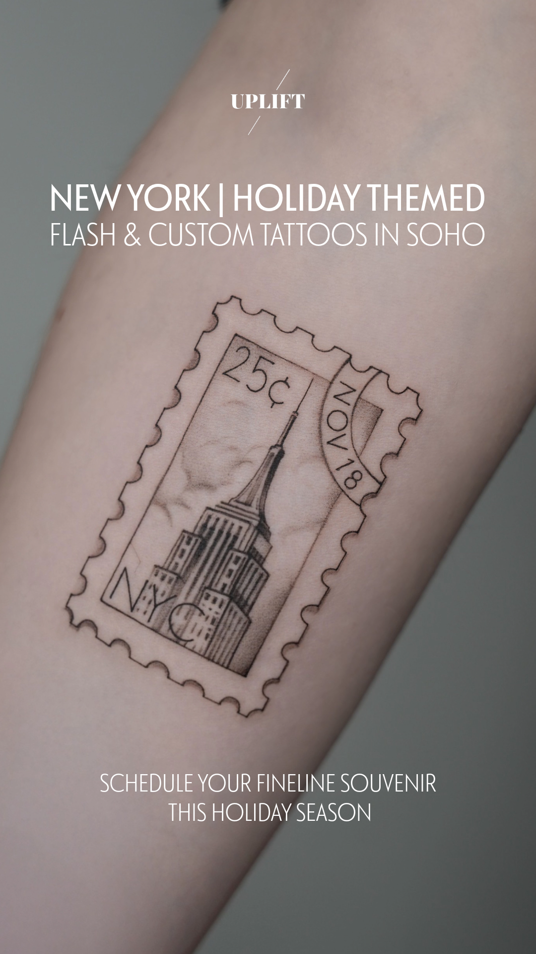 Tattoo of a vintage New York City postage stamp featuring the Empire State Building on a person's arm.