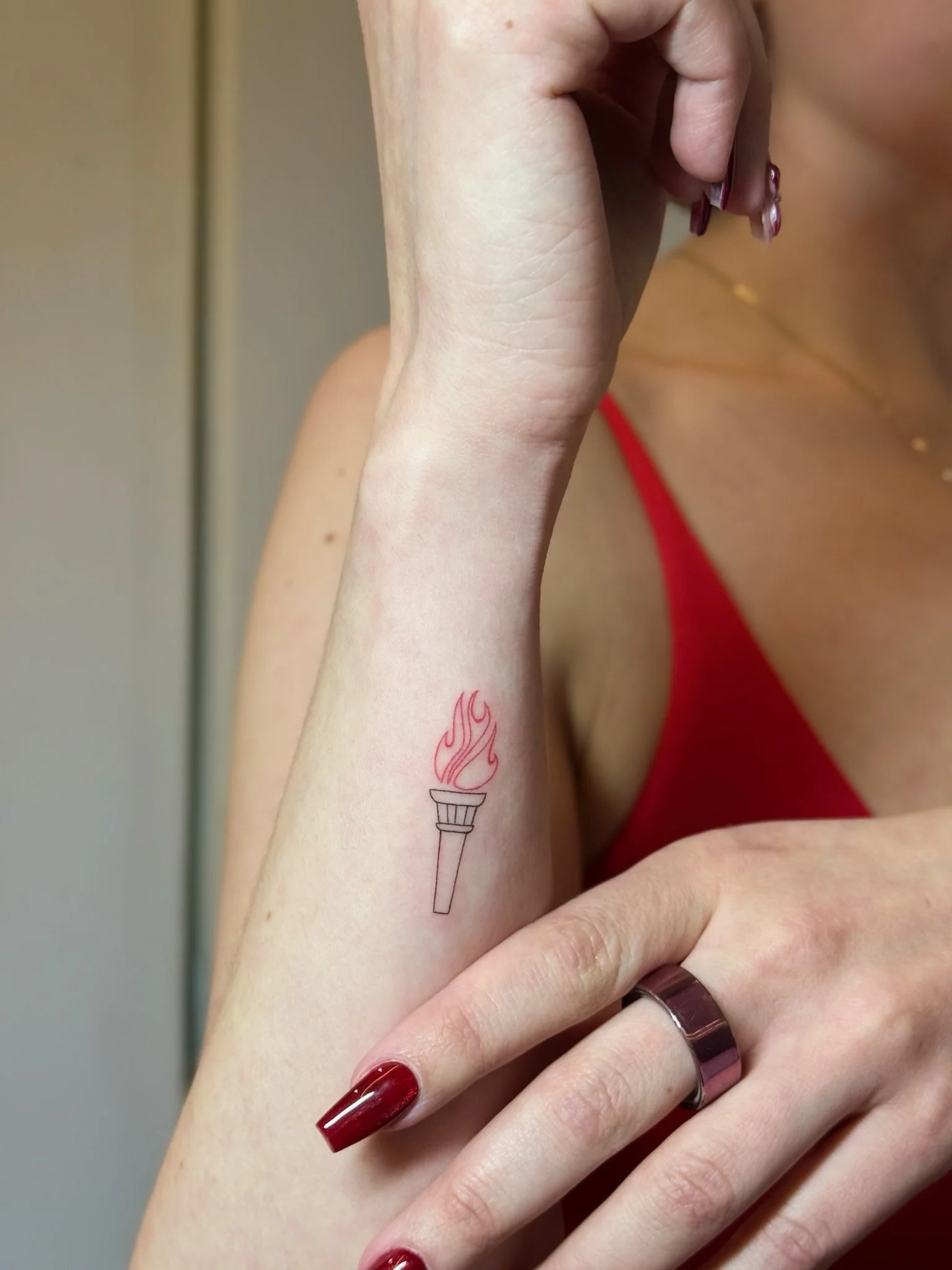 julia-fineline-statue-of-liberty-torch-tattoo-soho-nyc-uplift.jpg