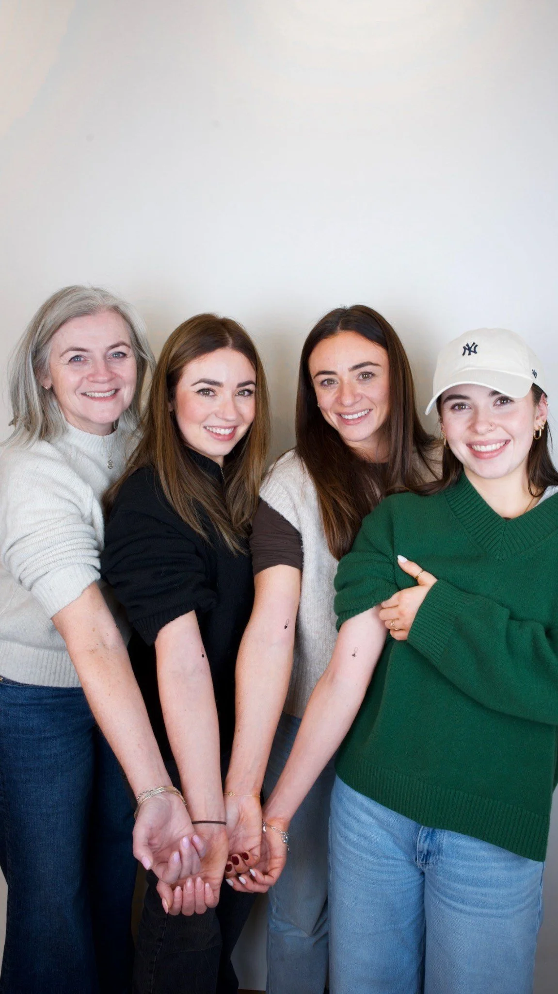 Walk-in Group Tattoos in New York City fineline designs on arms