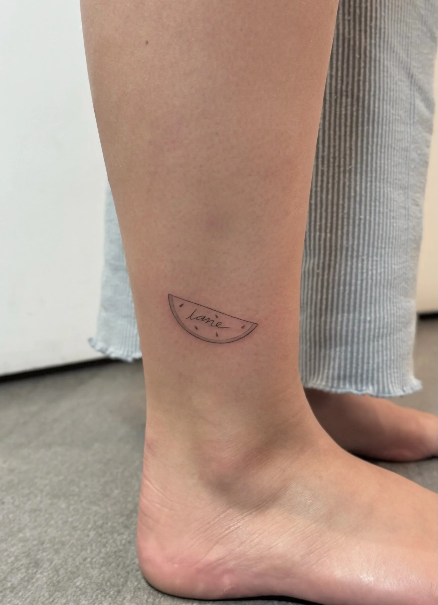 julia-fineline-name-watermelon-ankle-tattoo-soho-nyc-uplift.jpg