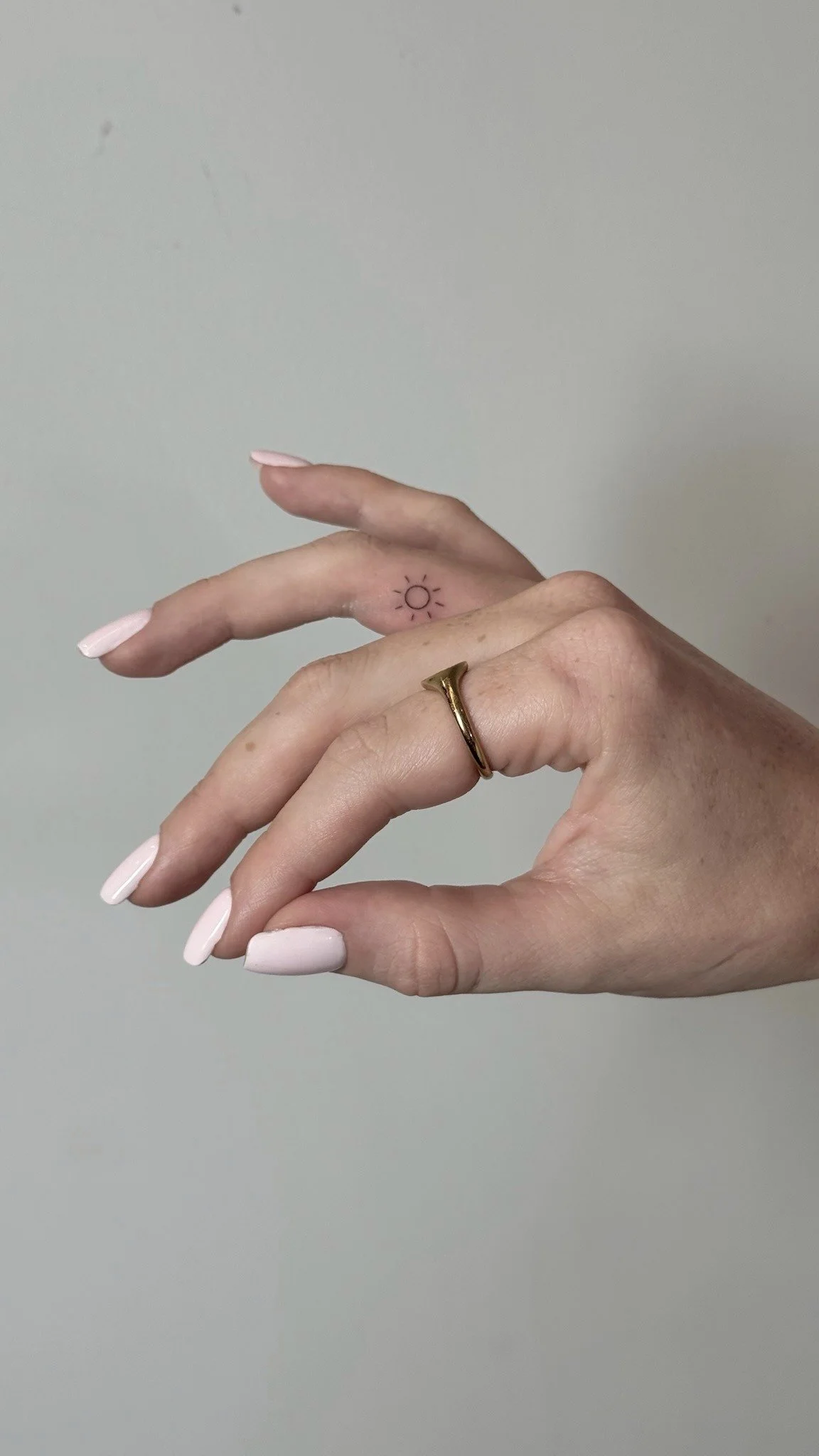 uplift-fineline-sun-finger-tattoo-soho-nyc.jpg
