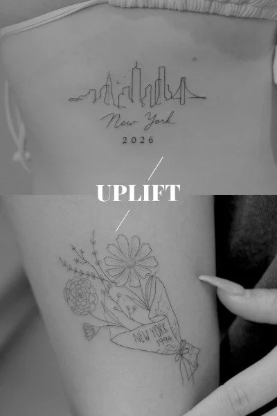 A person's side torso tattoo featuring a skyline of New York City, the word "UPLIFT," and a bouquet of flowers with a banner reading "NEW YORK 1994."