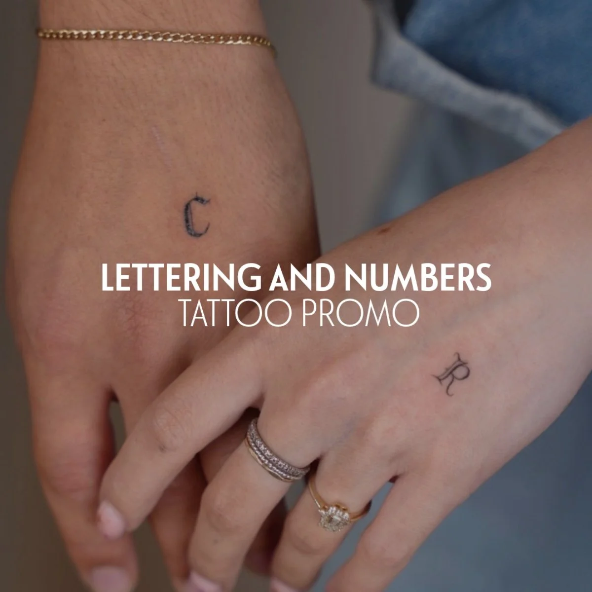 Close-up of two hands with tattoos of a letter 'C' on one wrist and a letter 'R' on the other, wearing rings and a gold bracelet, with text overlay promoting a tattoo studio's lettering and numbers tattoo promo.