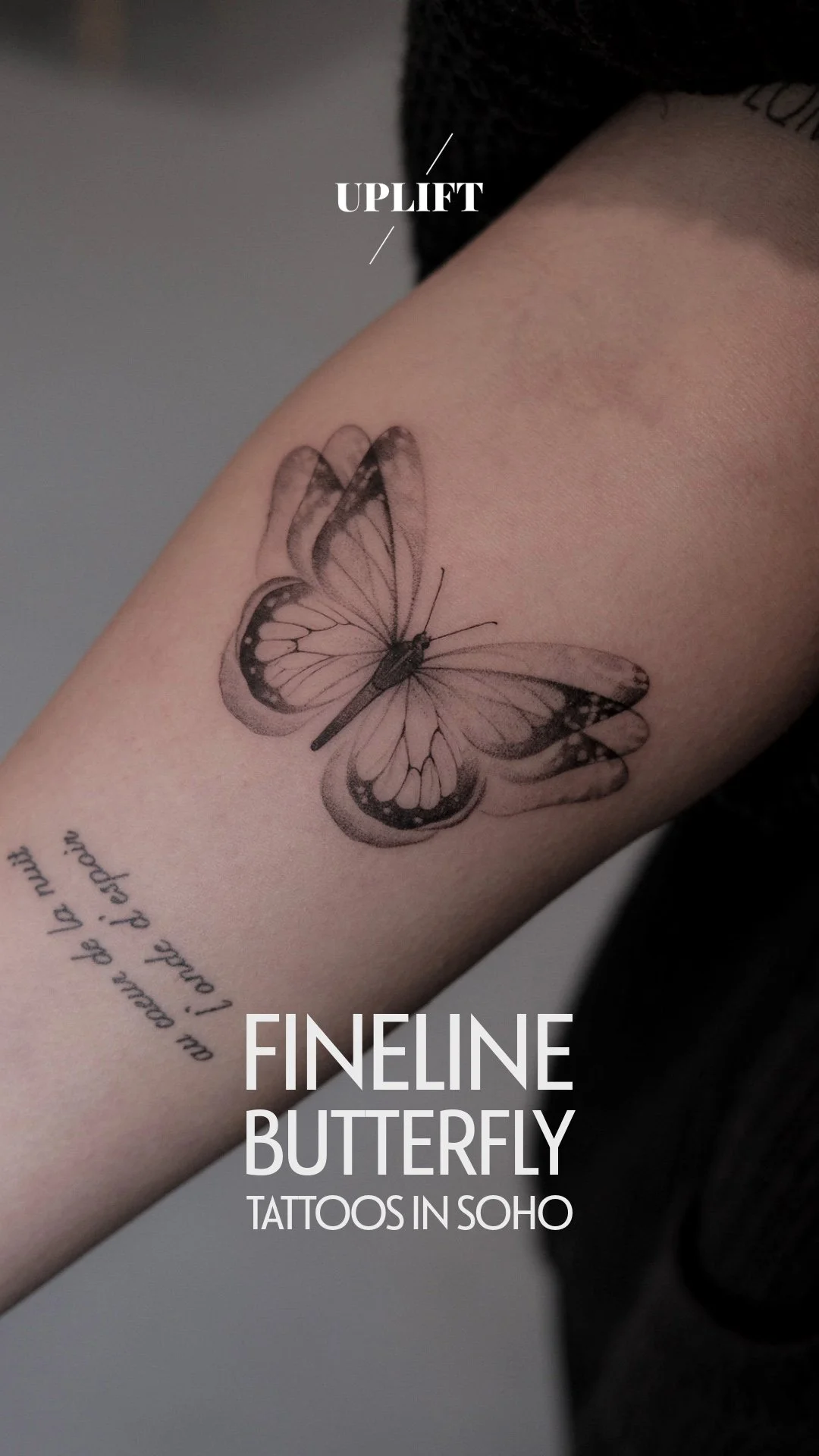 A close-up of a person's upper arm showing a detailed butterfly tattoo in black and gray ink. Text overlay reads 'UPLIFT'. Additional text says 'we don't be melt in, i don't'.