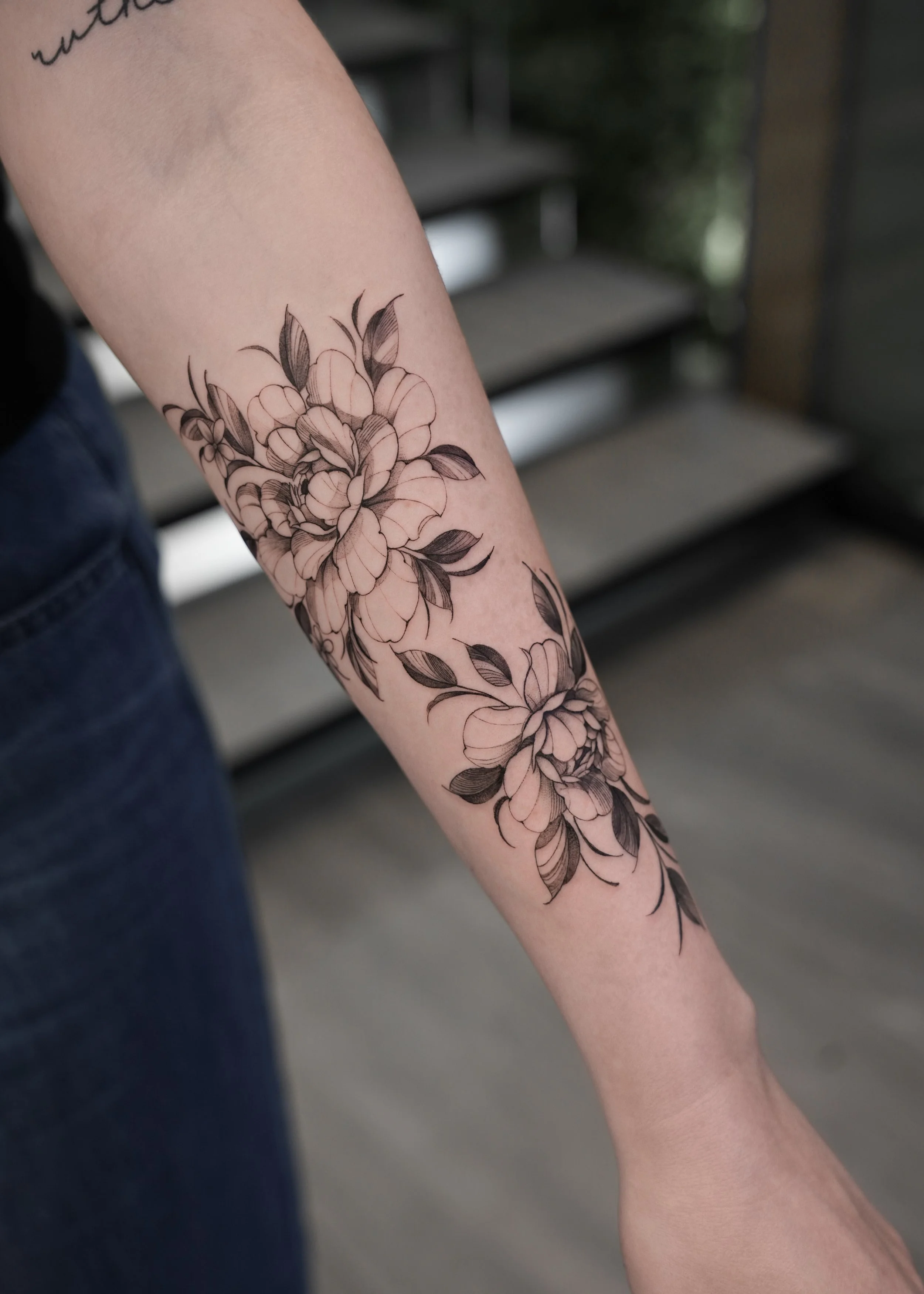 julia-fineline-peony-flower-forearm-tattoo-soho-nyc-uplift.jpg