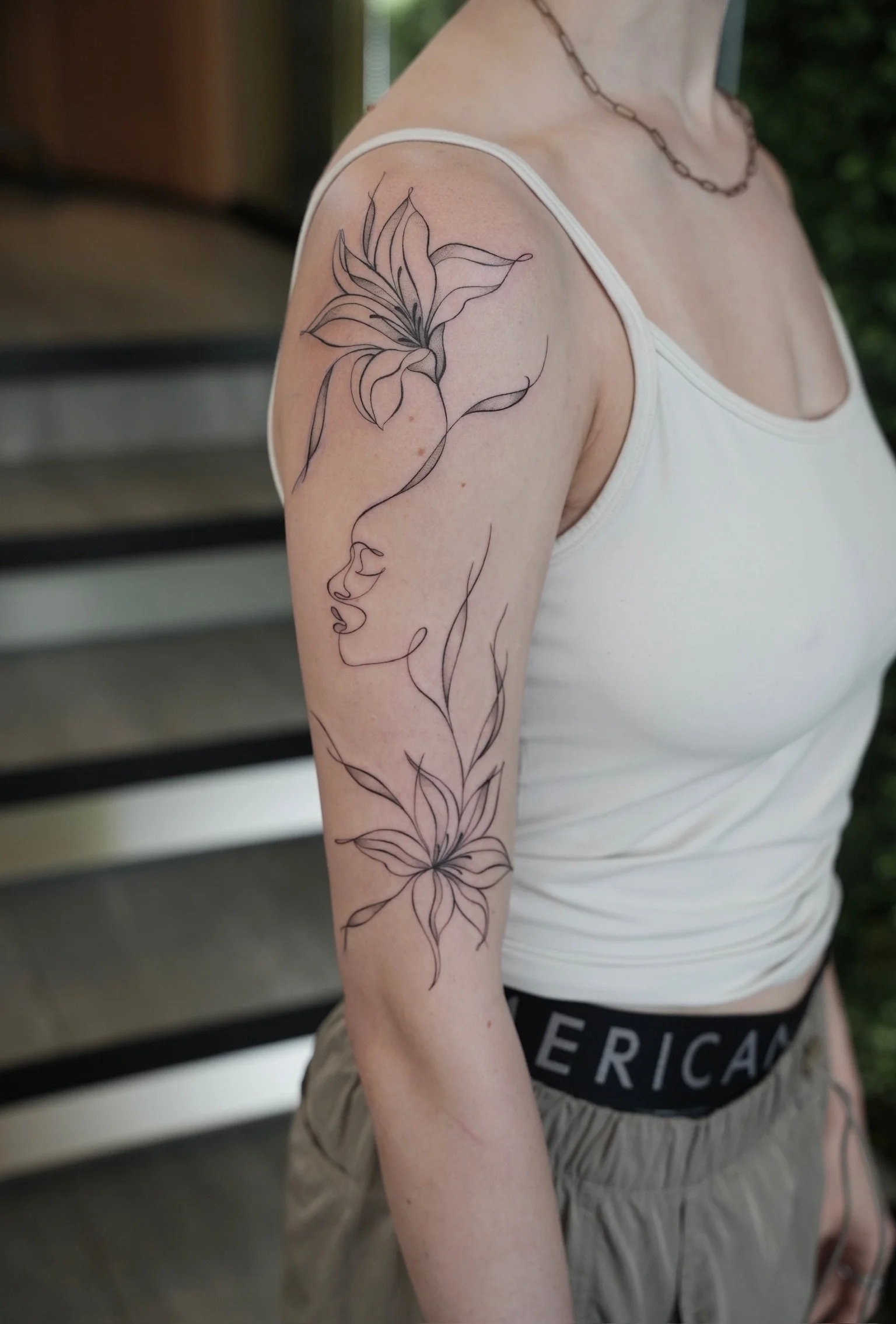 julia-fineline-micro-realism-floral-face-tattoo-soho-nyc-uplift.jpg