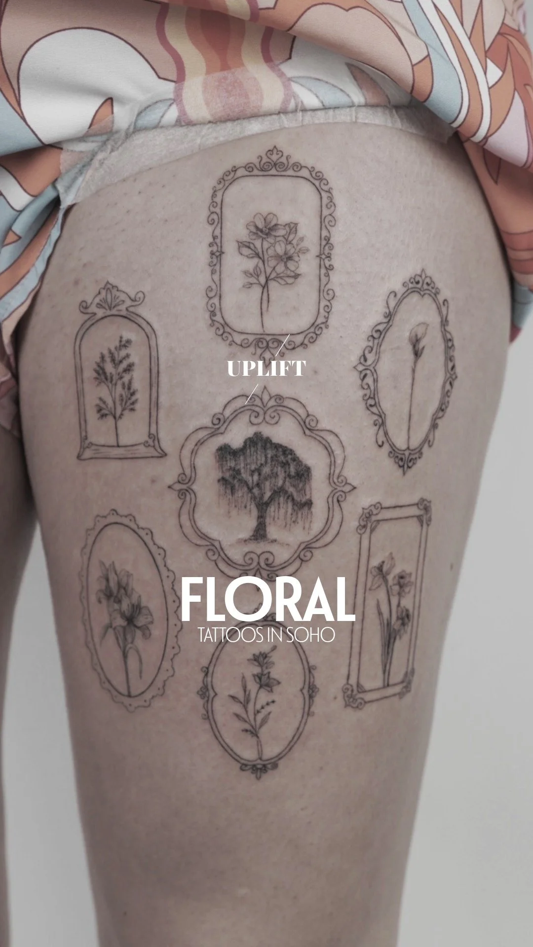 Tattoo of various floral designs in ornate frames on a person's thigh, with a centered tree tattoo and a text overlay for a floral tattoo studio in Soho.