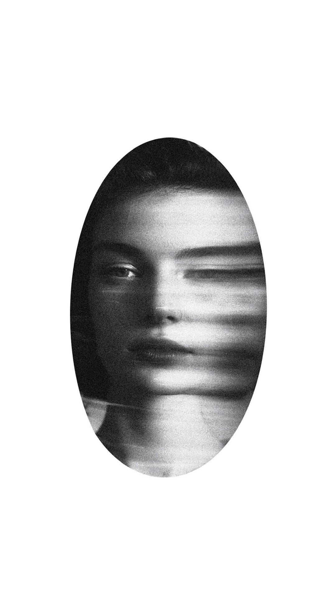 Black and white portrait of a woman with short hair looking at the camera, with a blurred motion effect