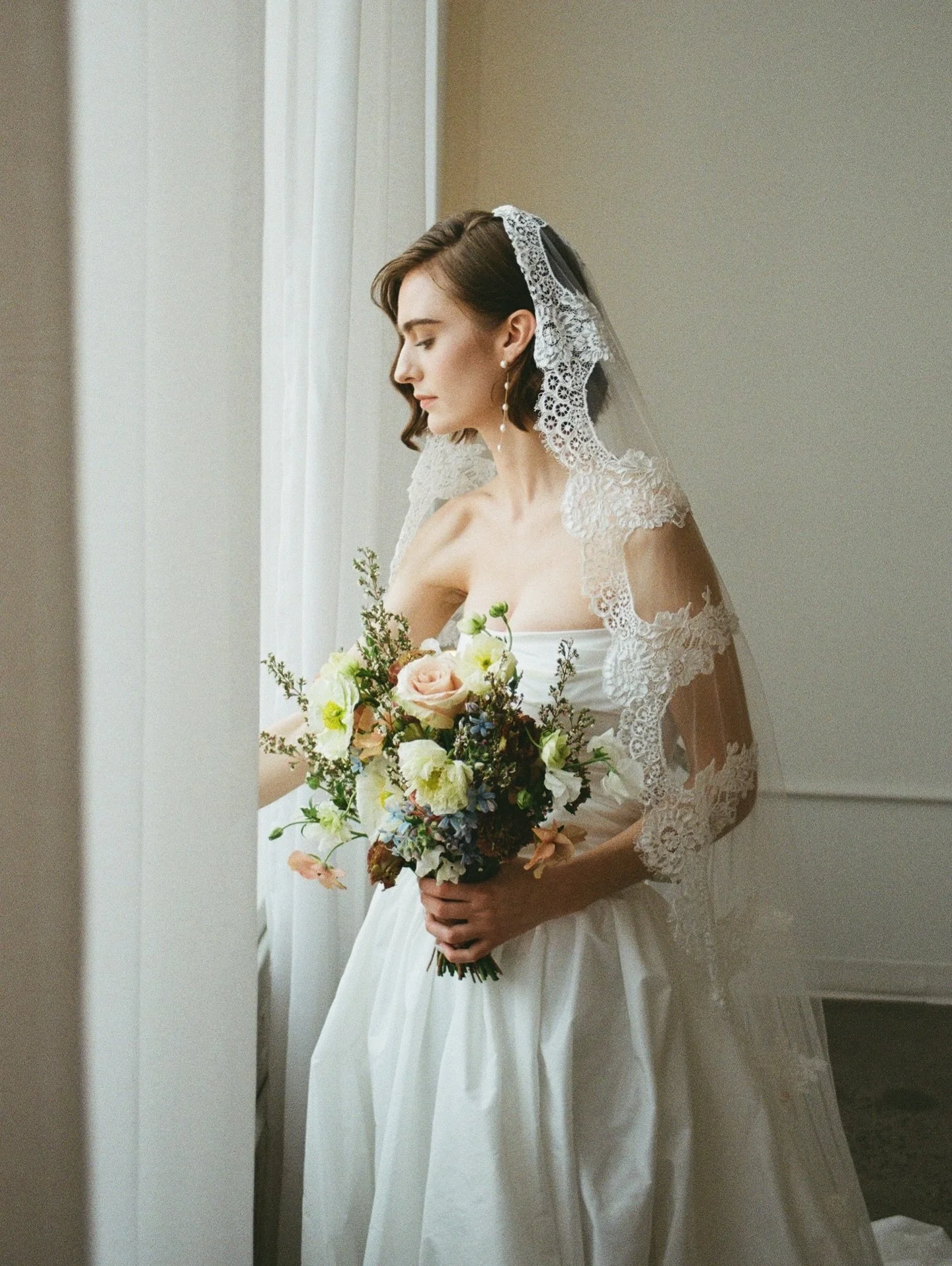 Film magic 🎞️

Vendors:

Planner &amp; Host: @realmplanning
Florist, Decorator &amp; Host: @kalie.nicole.events
Lead Photographer &amp; Host: @kpimagery
Venue: @urbandaisyevents
Dress: @ivorybridalco
Hair &amp; Makeup: @emilythebeautyartist
Bridal M