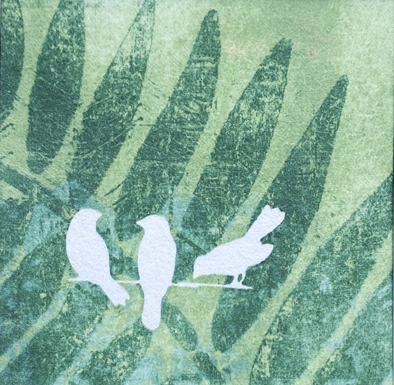 Birds on a leaf cropped.jpg