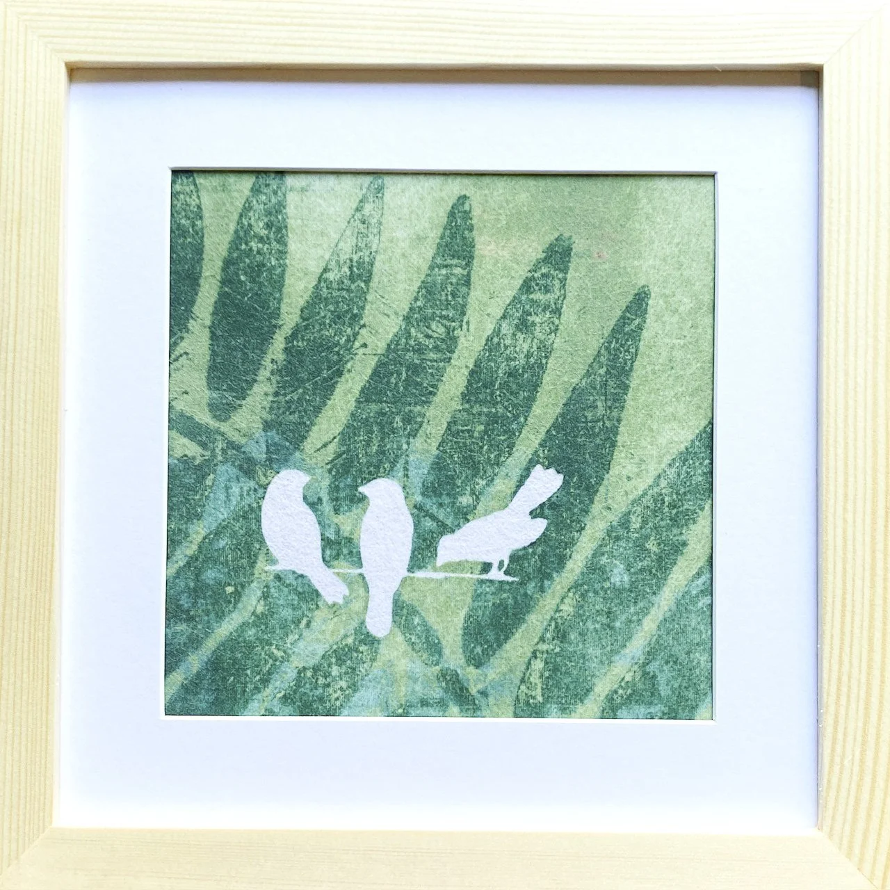 Birds on a leaf framed.jpg