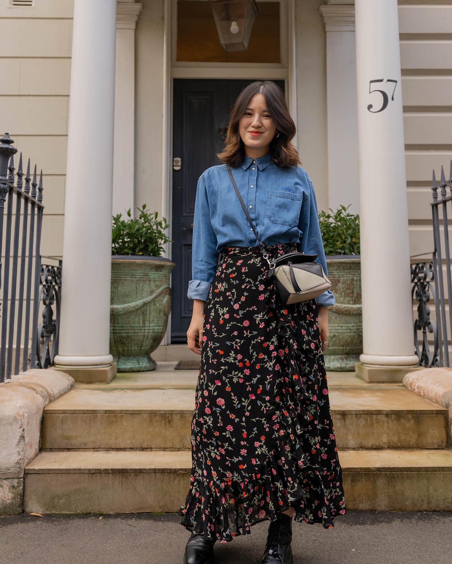Matching this very colourful skirt with a denim shirt today. When in doubt, I like to pick out a colour on the print and match my outfit to the print. There&rsquo;s some blue in the floral and I used my blue shirt to tie in with the skirt⁣
⁣
⁣
⁣
⁣
⁣
