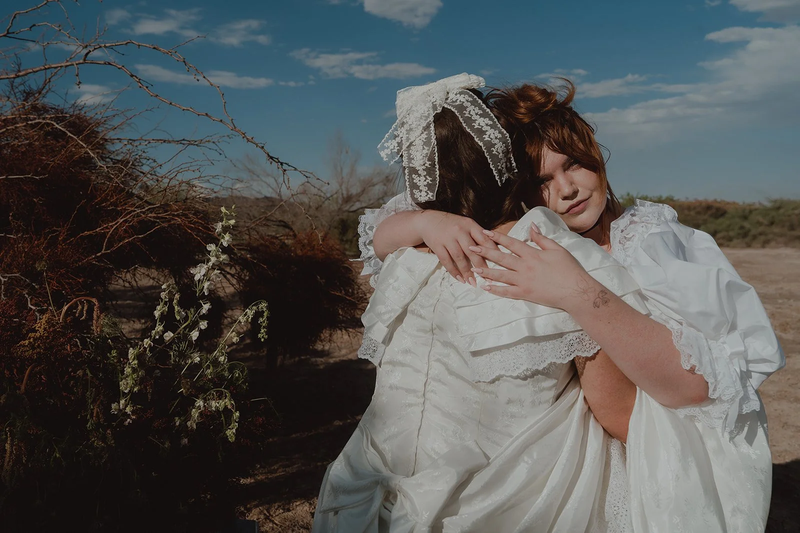 images by Cruz Valentin Photo and featuring Whitney Vertucci and Maxime Pardo in Glass Canary Vintage with accessories by The Veil Project.