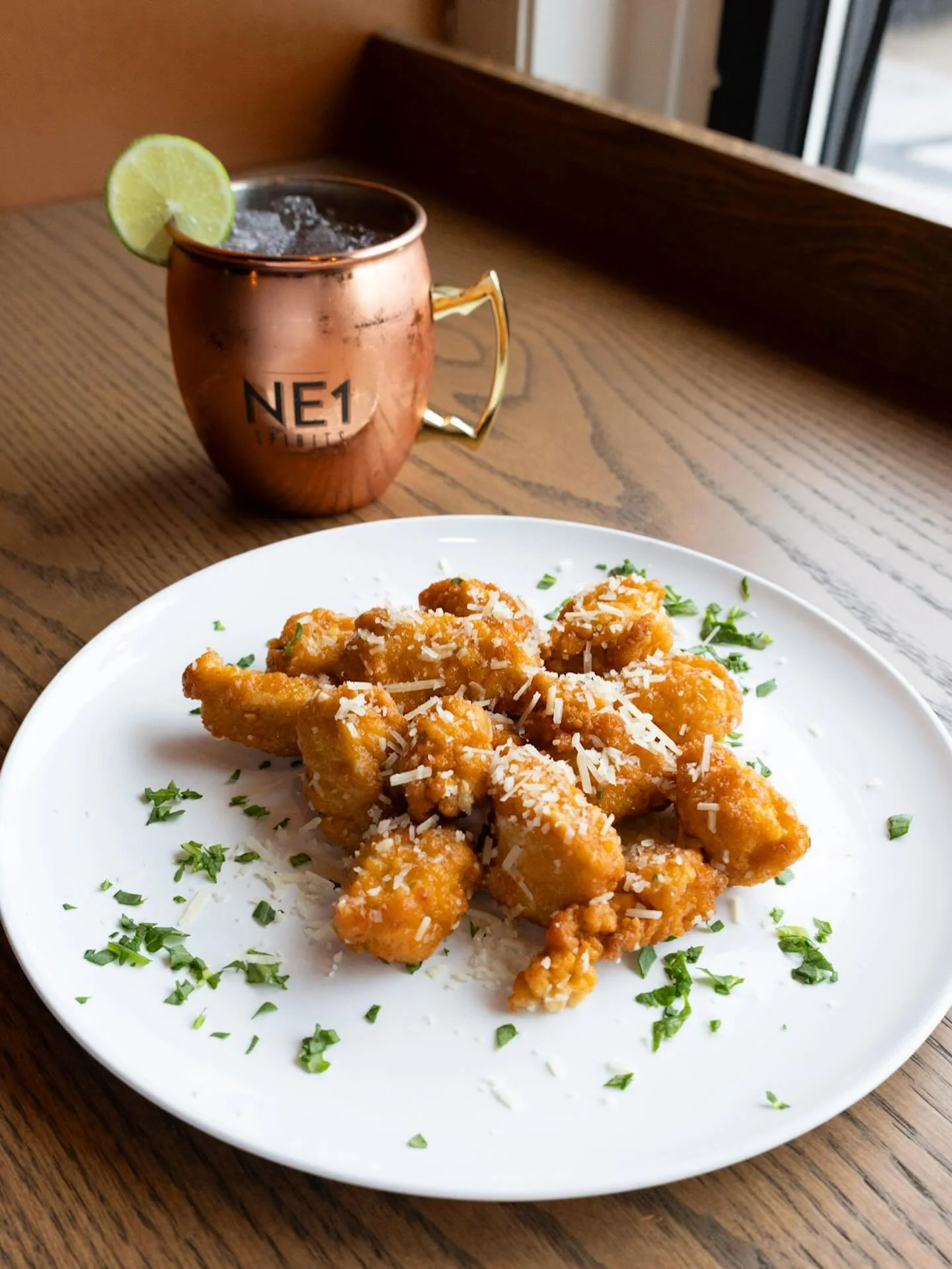 Open regular hours for Good Friday! 

Check out our new spring menu, you are sure to love the Garlic Parmesan Chicken Bites. 

Stop in for a sip, featuring our Blue Bunny Colada and our Boozy Bunny Cold Brew made with @ne1spirits Vodka. 

See you at 