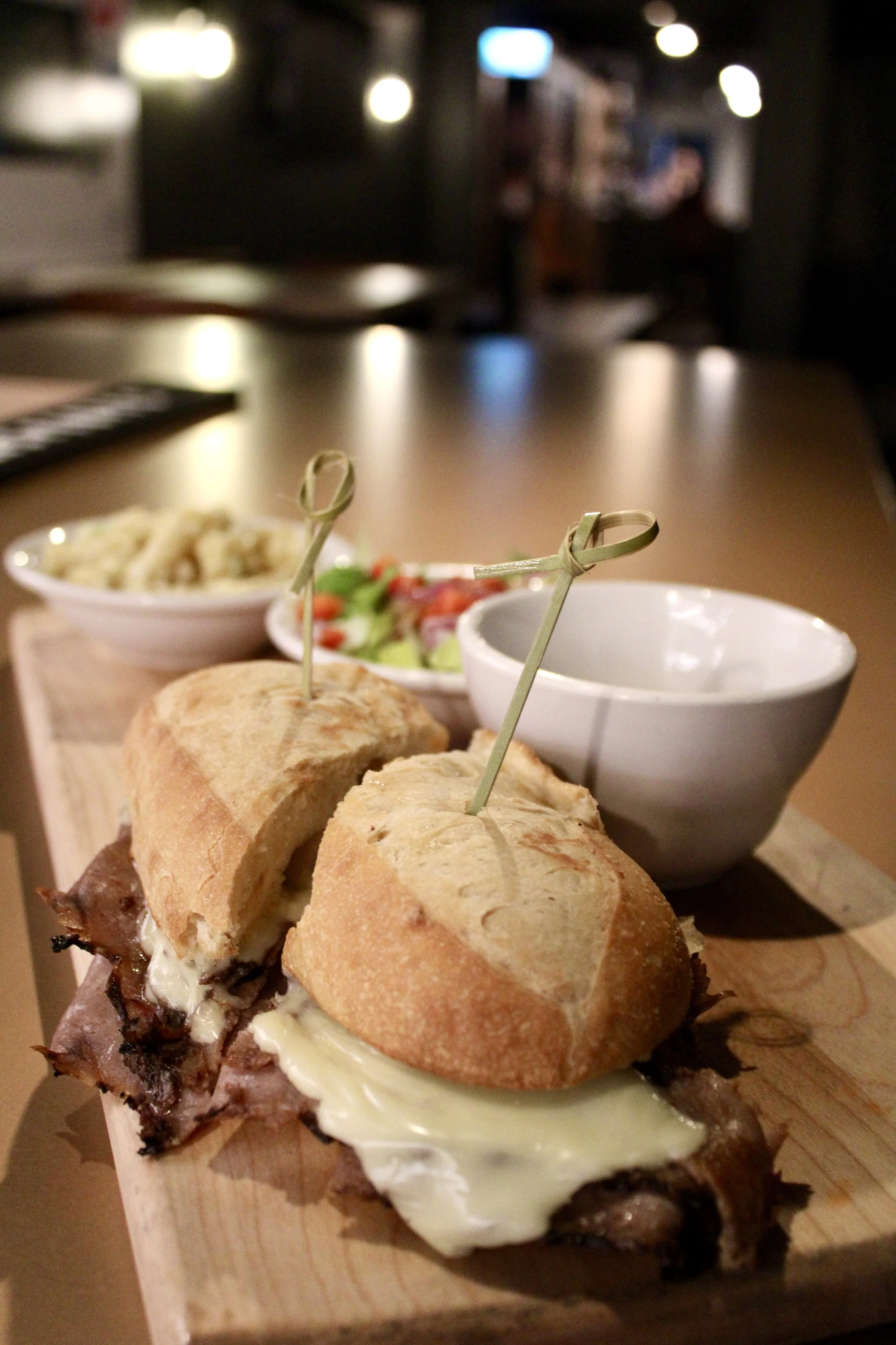  Beef Dip 
Tender roast beef topped with melted swiss cheese and horseradish mayo. Served warm on a toasted hoagie bun with savoury au jus for dipping.