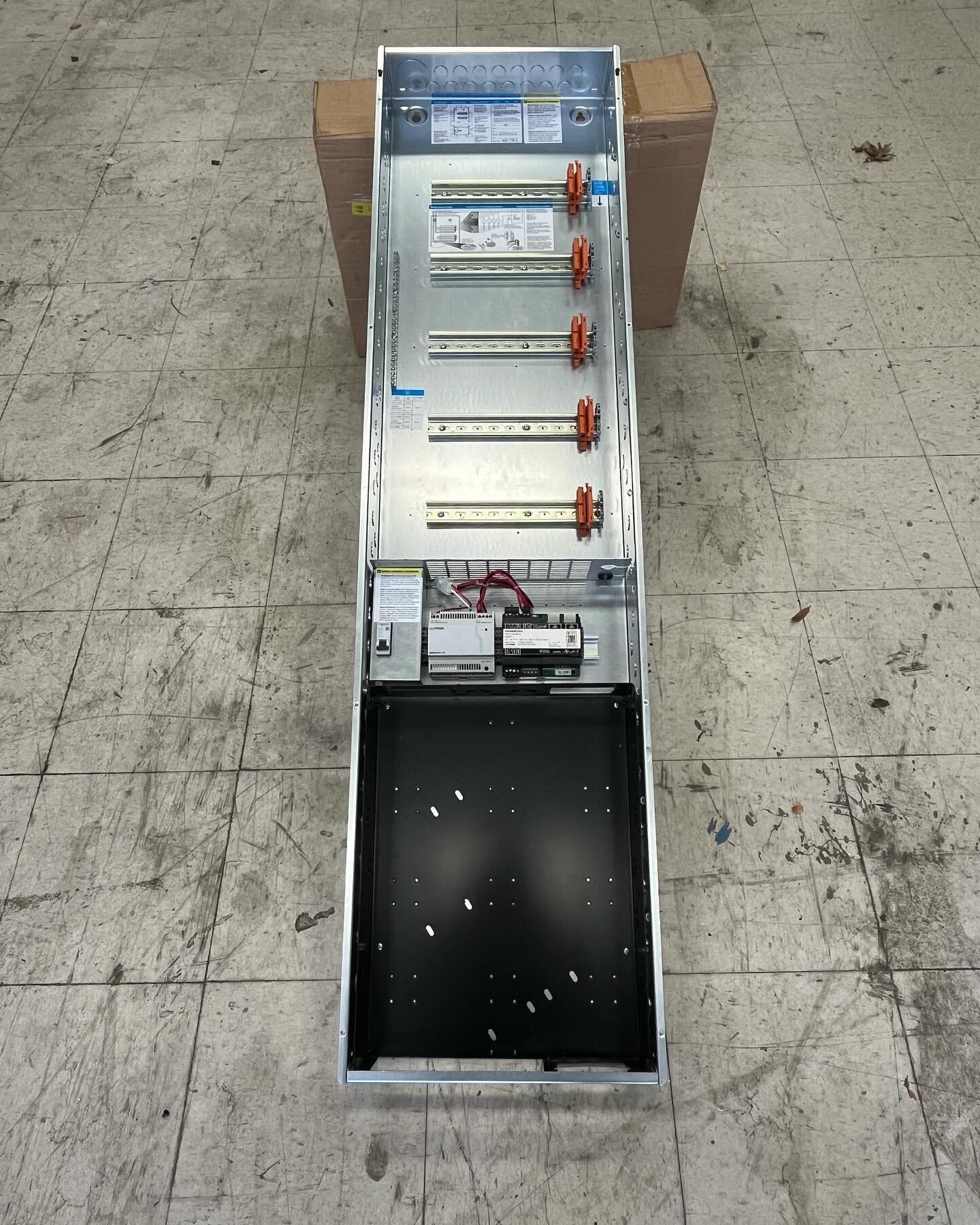 S W I P E &gt; &gt; &gt; Do to limited space the client asked if we could condense the lighting and LV panels into a single chassis. For this we modified and refit the @futureautomation LV panel into the @lutronelectronics lighting enclosure. Done! #