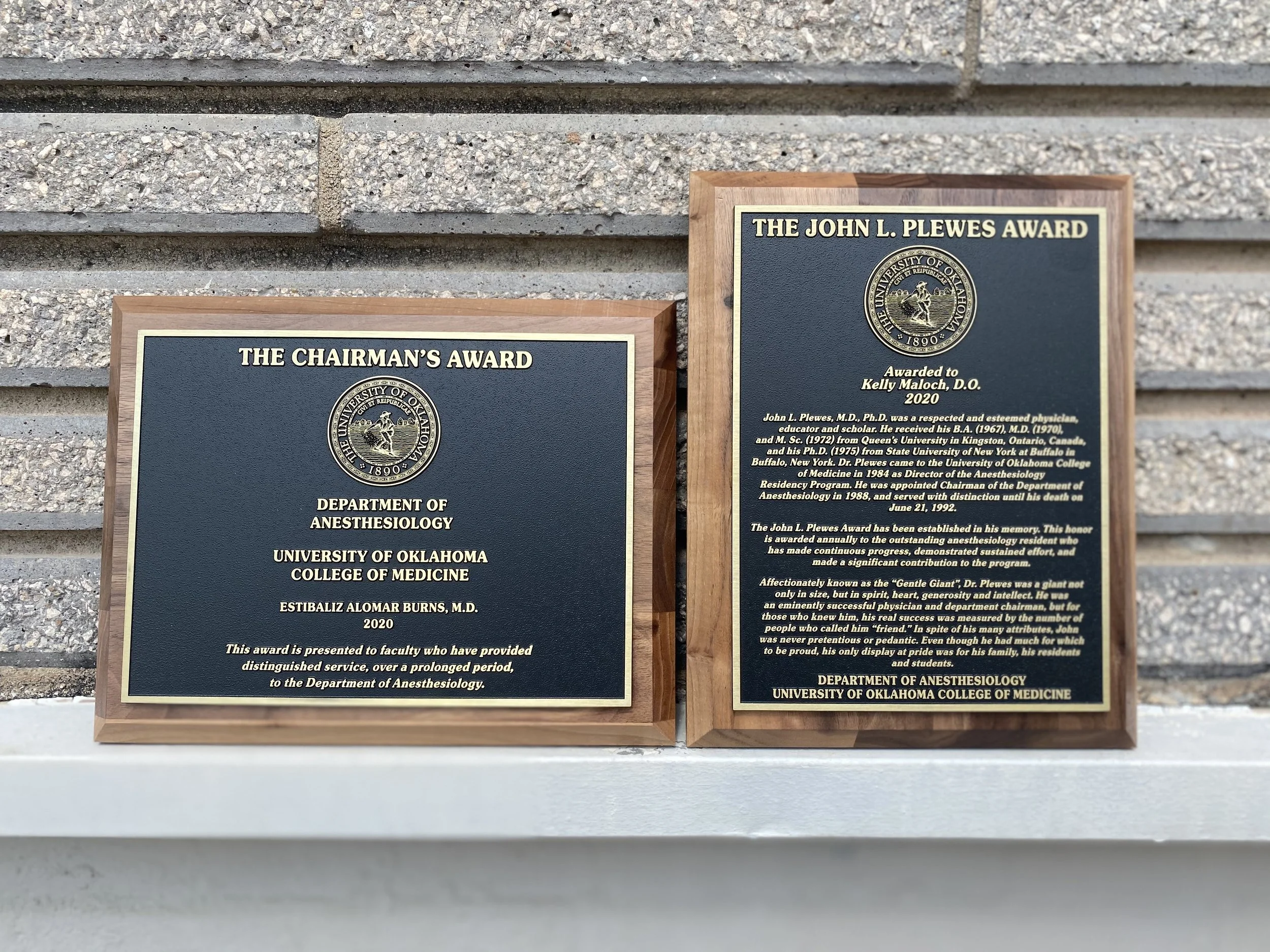 Elegant etched award plaques from the University of Oklahoma College of Medicine. Etched metal plaques provide fine detail, durability, and a classic professional appearance for indoor and outdoor use.