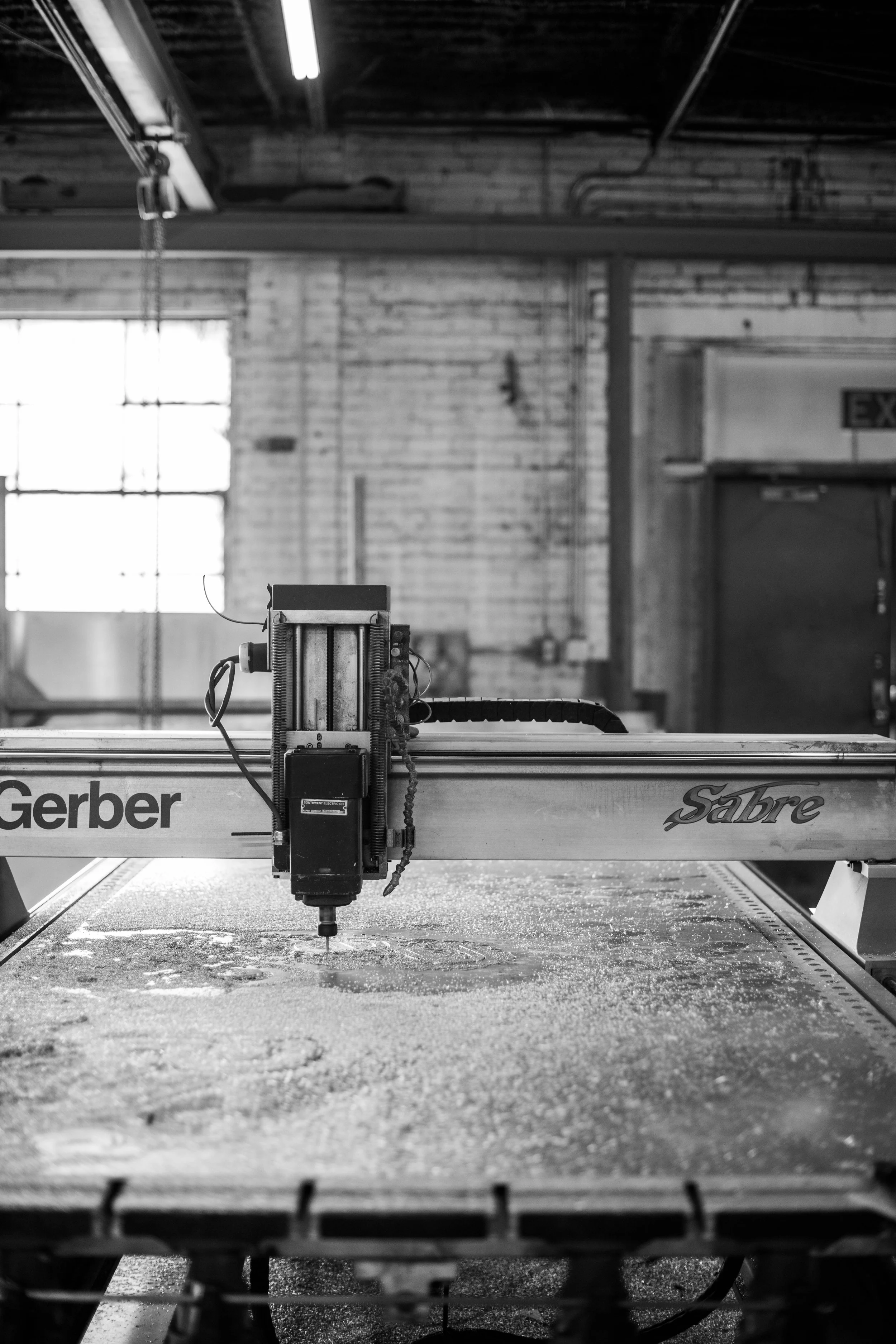 Precision CNC routing equipment operating inside the A.R.K. Ramos foundry, supporting signage companies with custom architectural signage as a trusted signage partner.