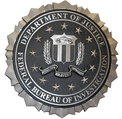 Front view of a cast metal plaque with raised lettering and brushed finish.