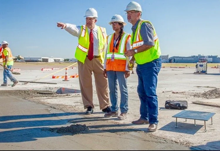 Construction team planning installation of Lyndon B. Anthony Plaque at Dallas Love Field