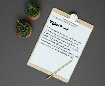 Clipboard holding a printed page explaining the concept of digital proof in custom product design and approval