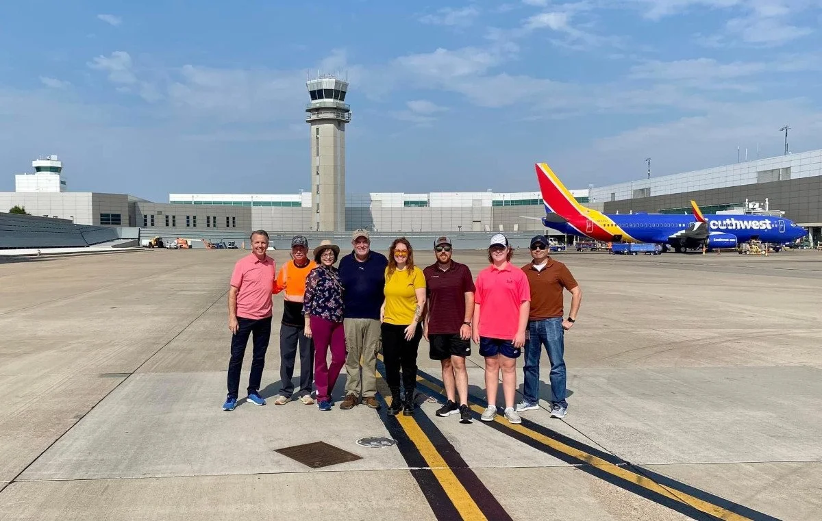 A.R.K. Ramos team posing at the installation of the Lyndon B. Johnson plaque at the Dallas Love Field