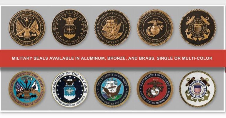 Display of multiple hand-painted military service seals in bronze, brass, aluminum, stainless steel, and zinc finishes.