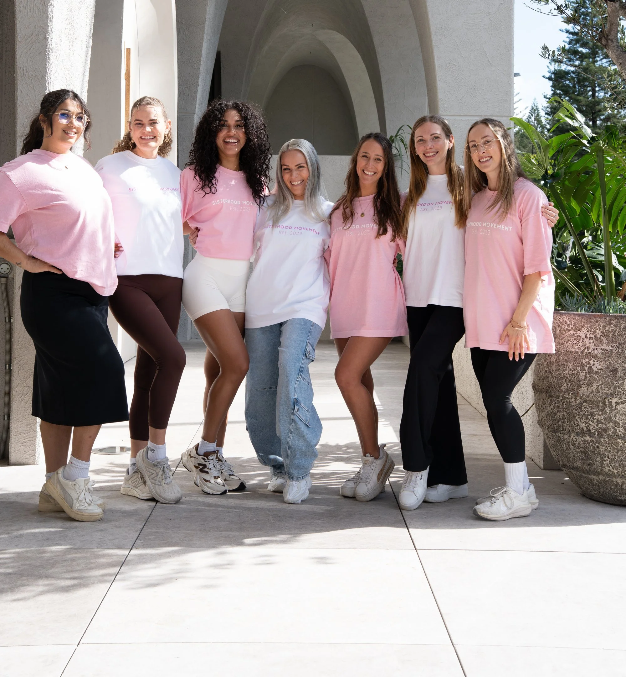 sisterhood_group_pink_crop.jpg