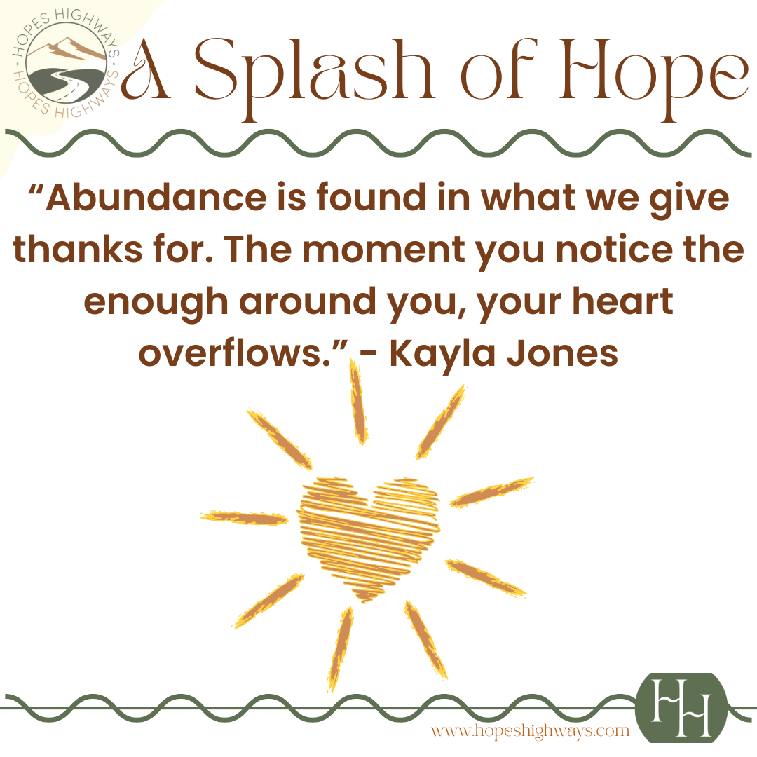 Inspirational quote about abundance and gratitude with a heart illustration surrounded by rays, from Hope's Highways.