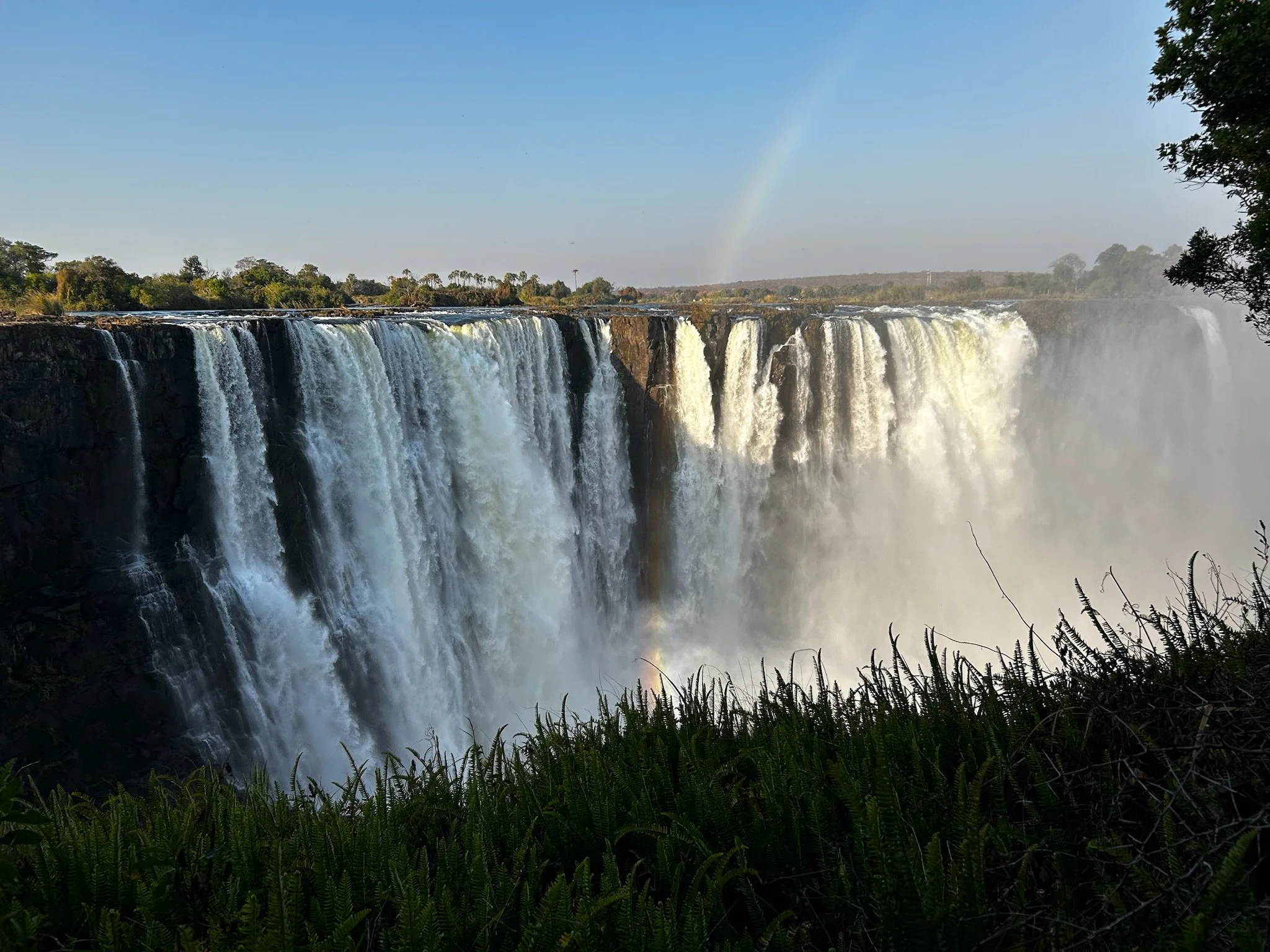 "Rainbow over Victoria Falls during Together we Breathe's wellbeing and safari retreat"