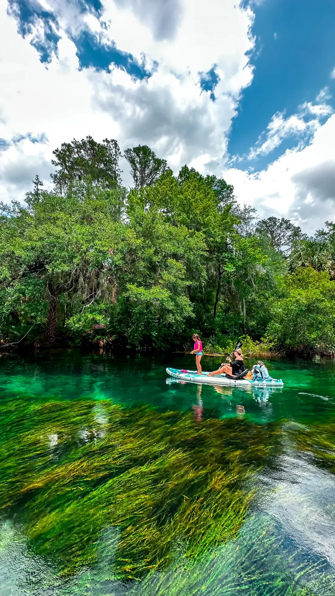 Paddle board kayak adventures on Rainbow River in Dunnellon Florida.