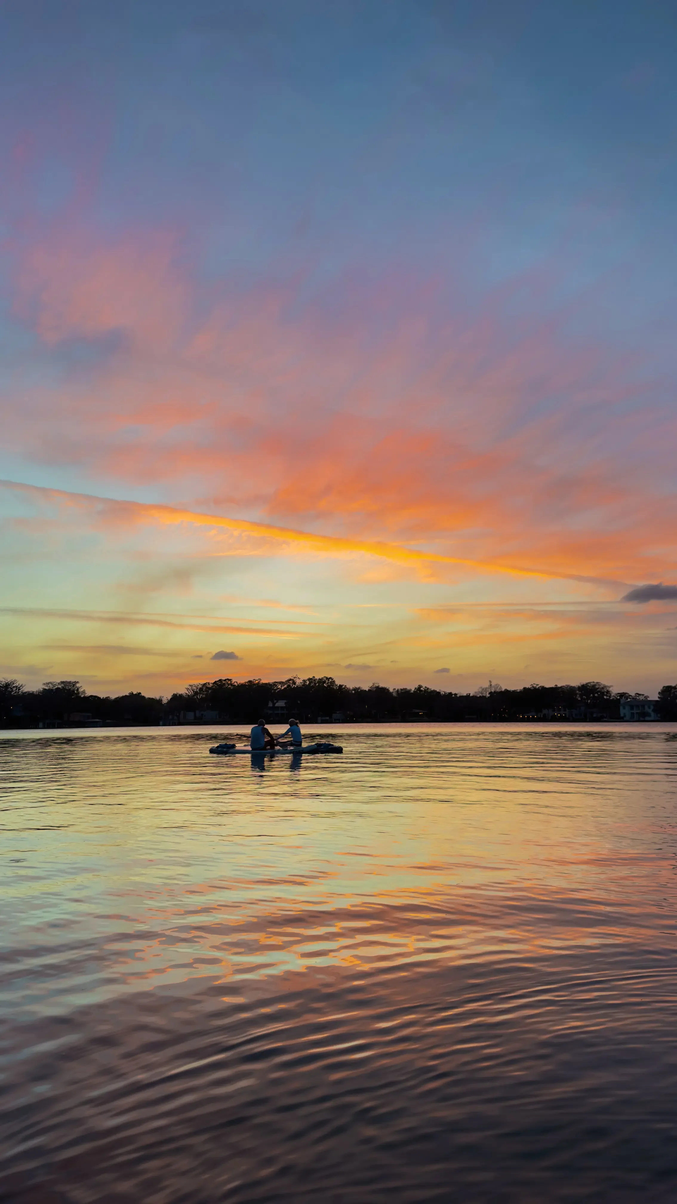 Sunset paddle tour on the Winter Park Chain of Lakes with Otter Paddle Orlando. 