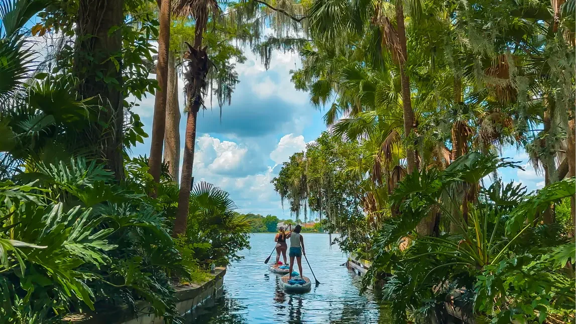Paddle the lush canals on the Winter Park Chain of Lakes with Otter Paddle Orlando. 