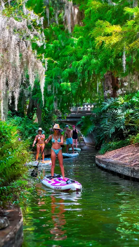 Paddle the beautiful canals on the Winter Park Chain of Lakes with Otter Paddle Orlando. 