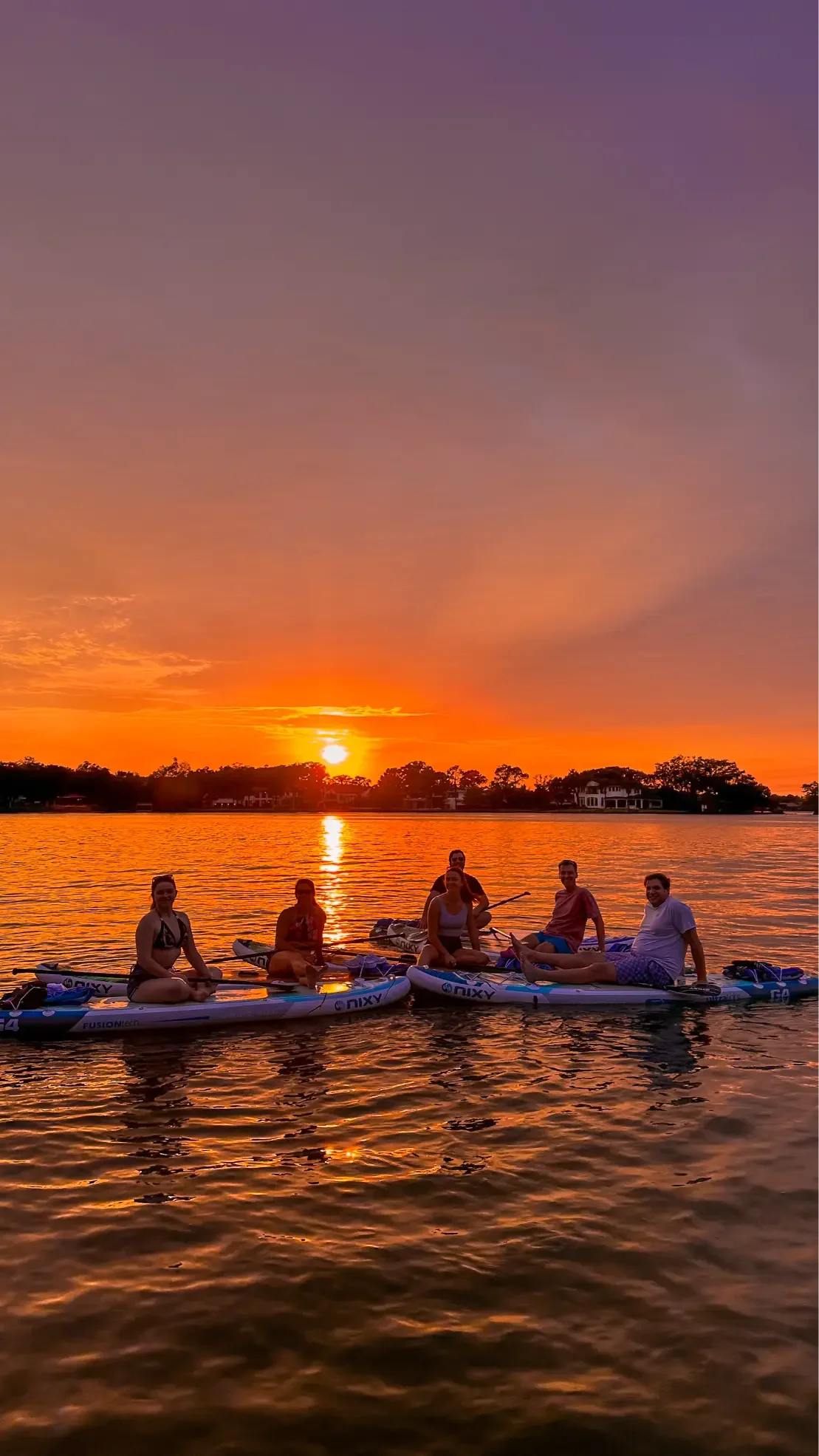 Sunset paddle boarding and kayak tours in Winter Park with Otter Paddle Orlando