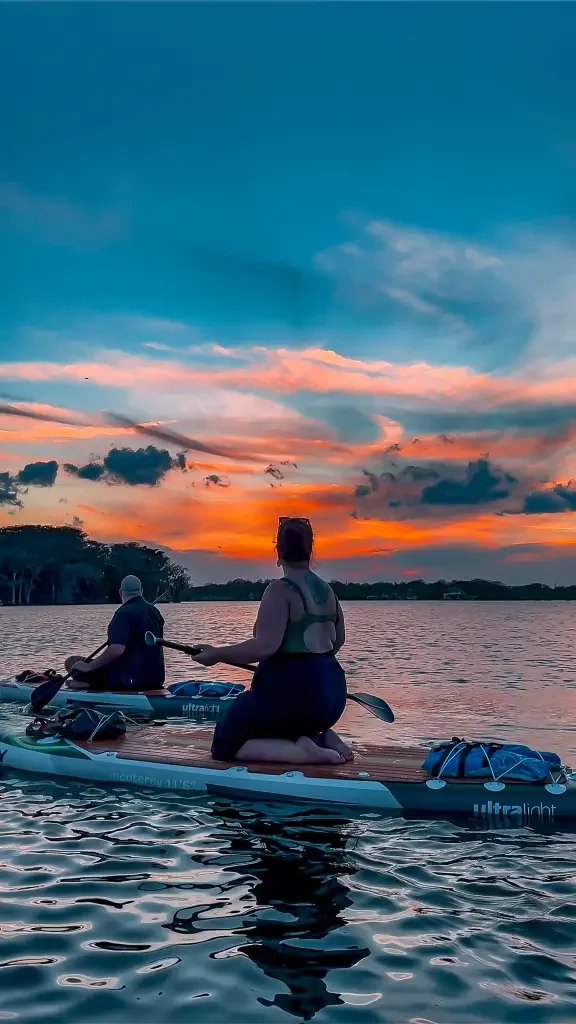 Sunset paddle tours with Otter Paddle Orlando in Winter Park Florida. 