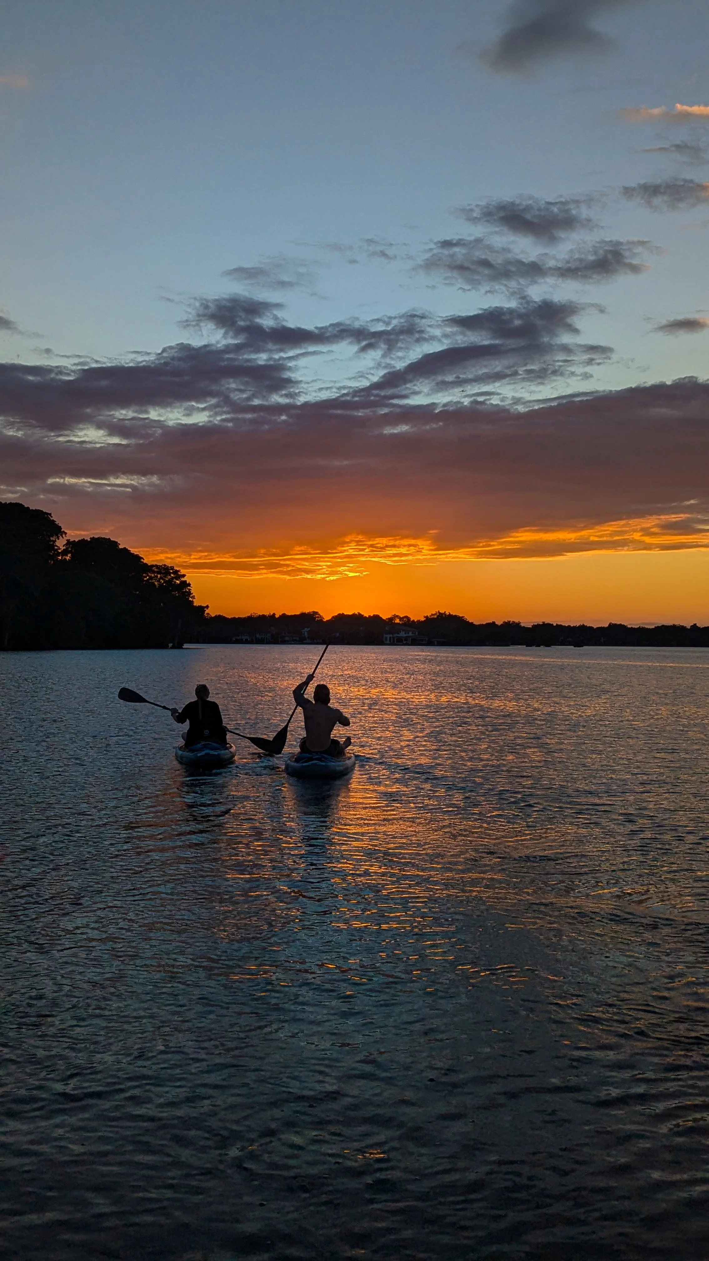 Sunset paddleboarding tour in Winter Park, FL – golden hour adventure on the Chain of Lakes with Otter Paddle Orlando