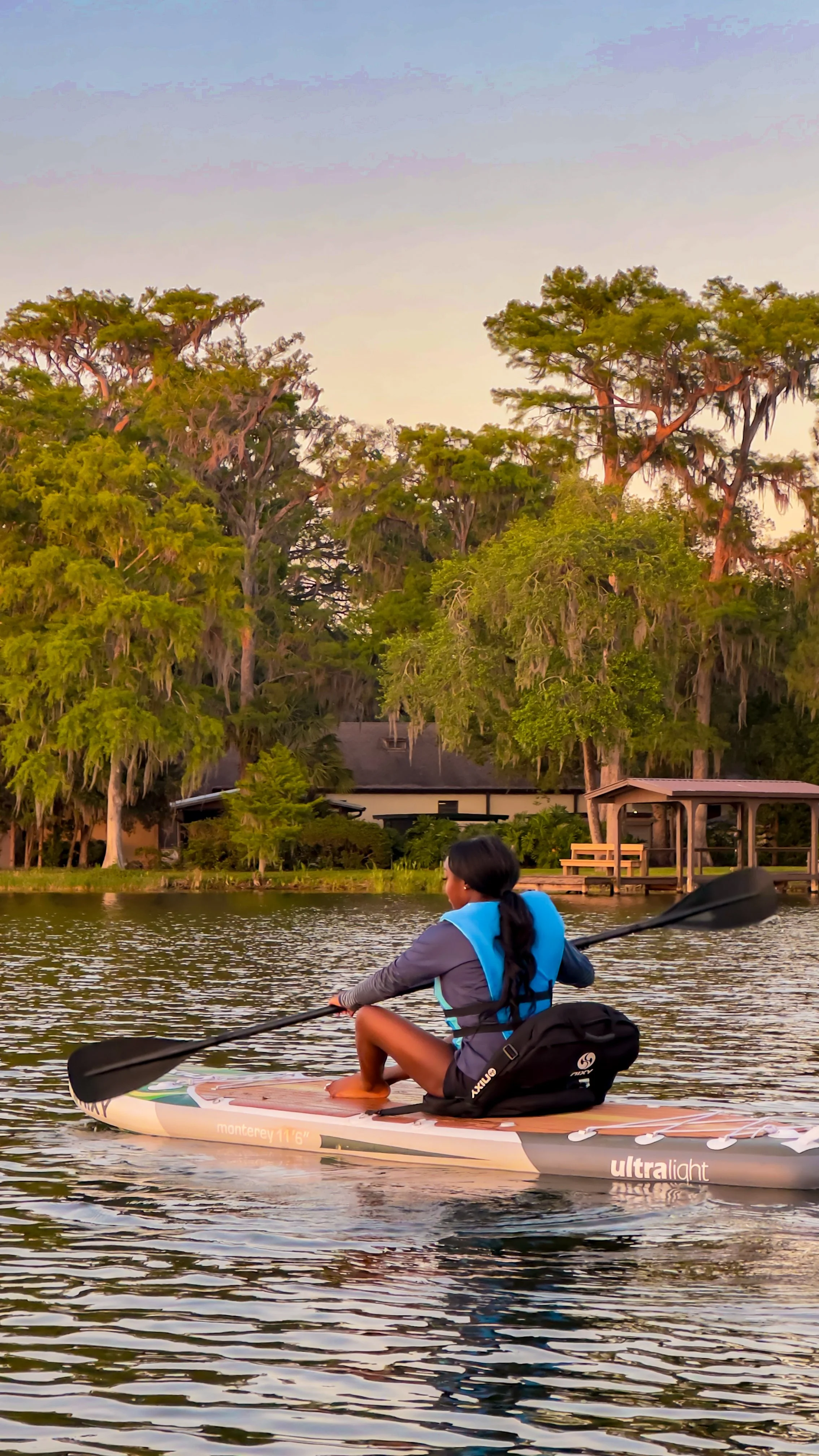 Sunset paddleboard and kayak hybrid setup on the Winter Park Chain of Lakes in Orlando, Florida