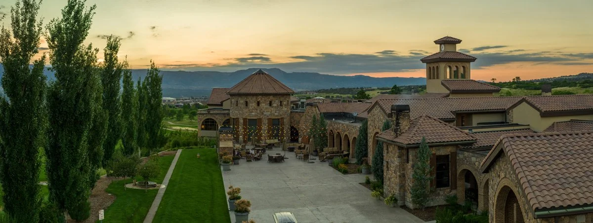 courtyard patio at sunset with bistro lights