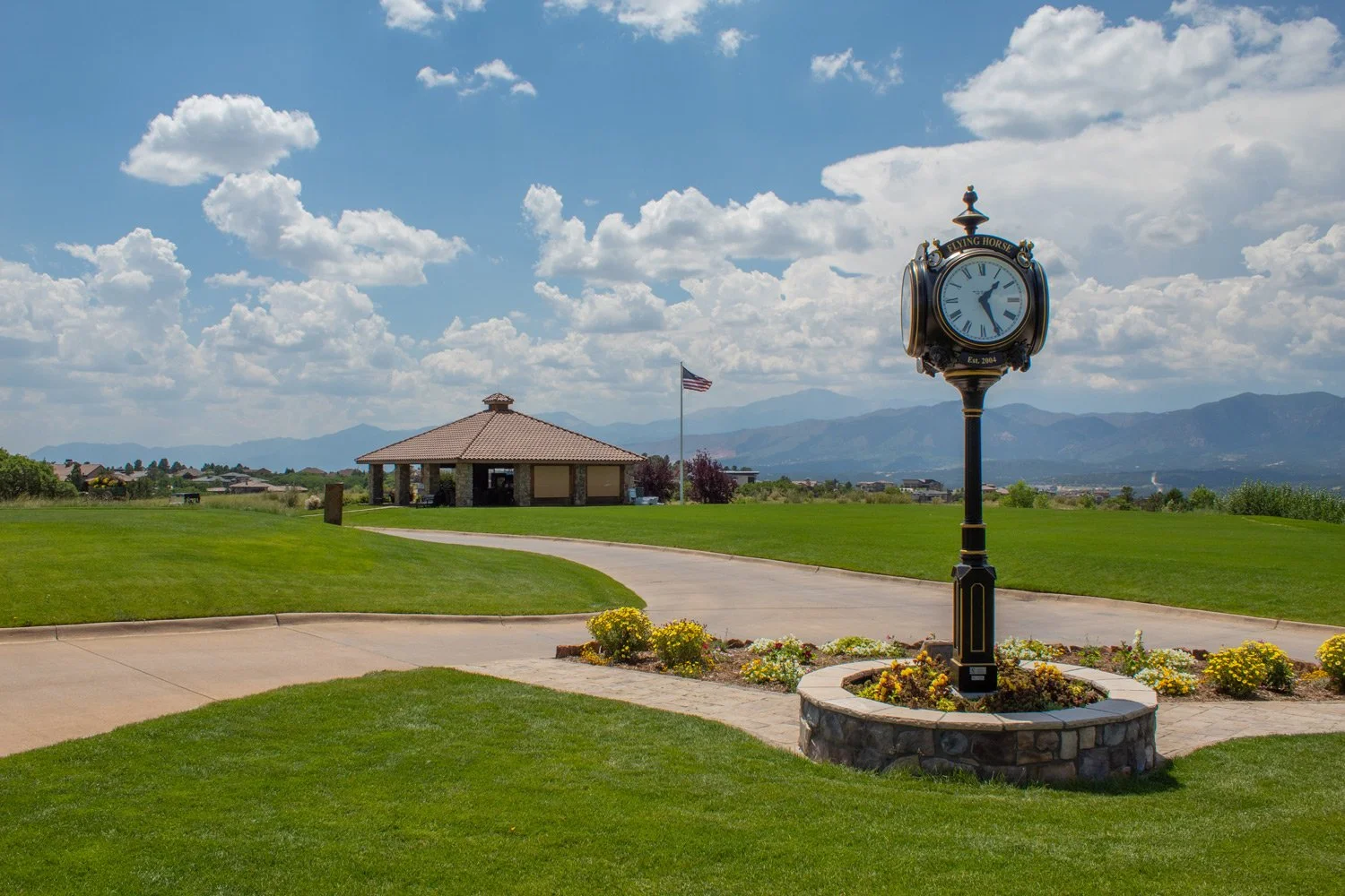 pavilion and clock at weiskopf golf course