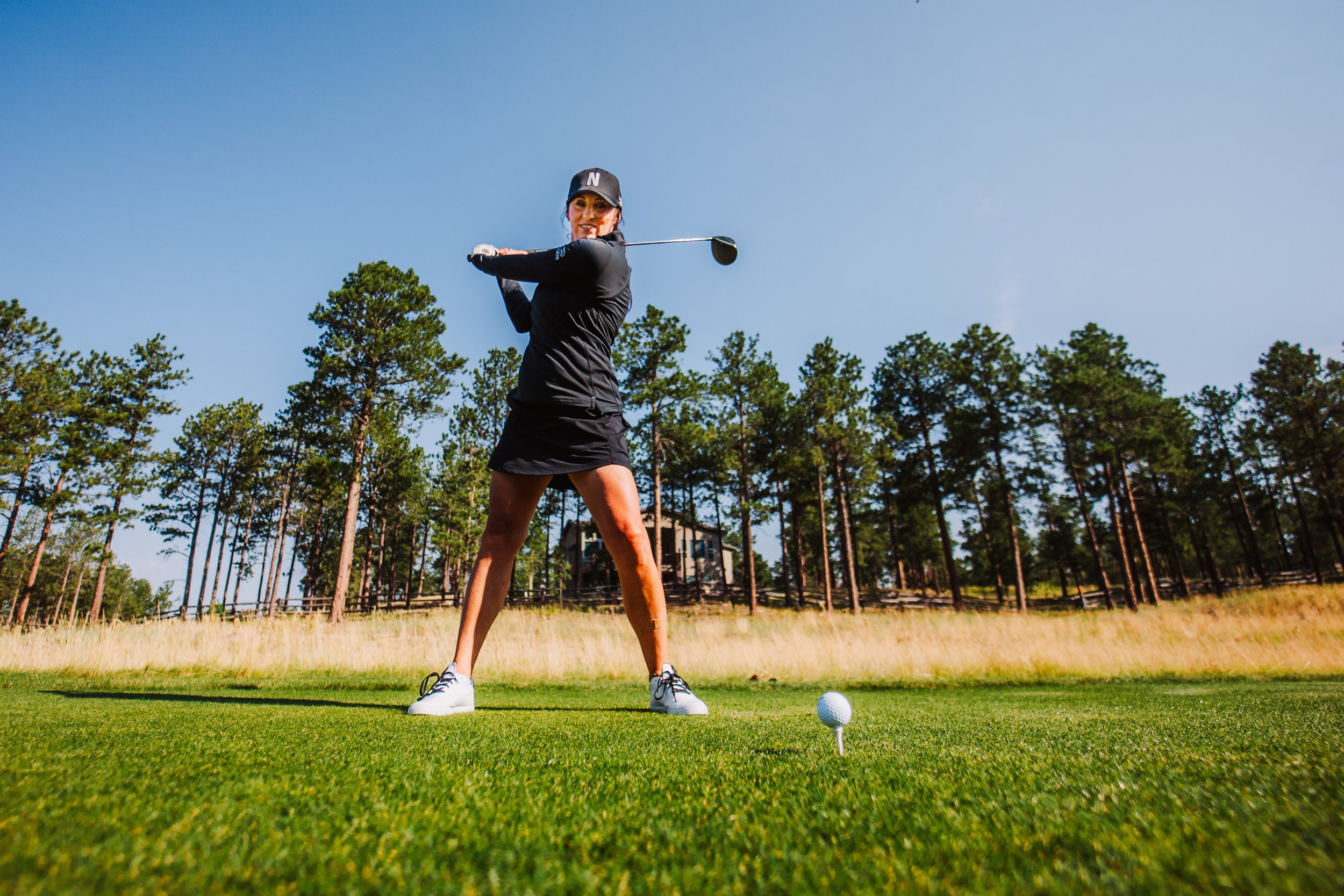 woman playing on the fairway on the north course