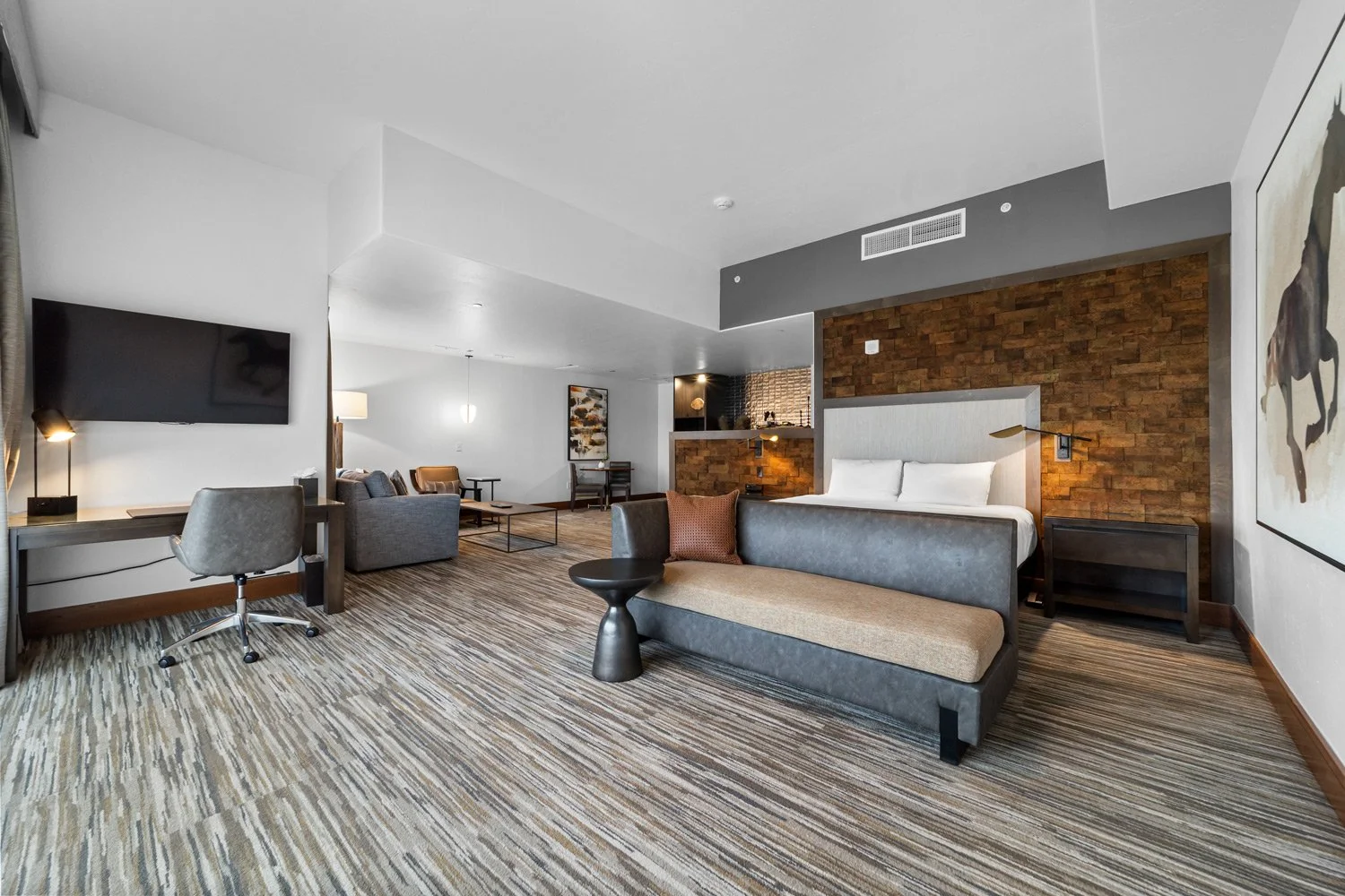 bed and work station in the academy suite