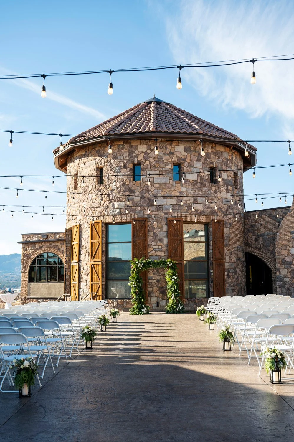 winter garland for ceremony arch in front of the wine tower