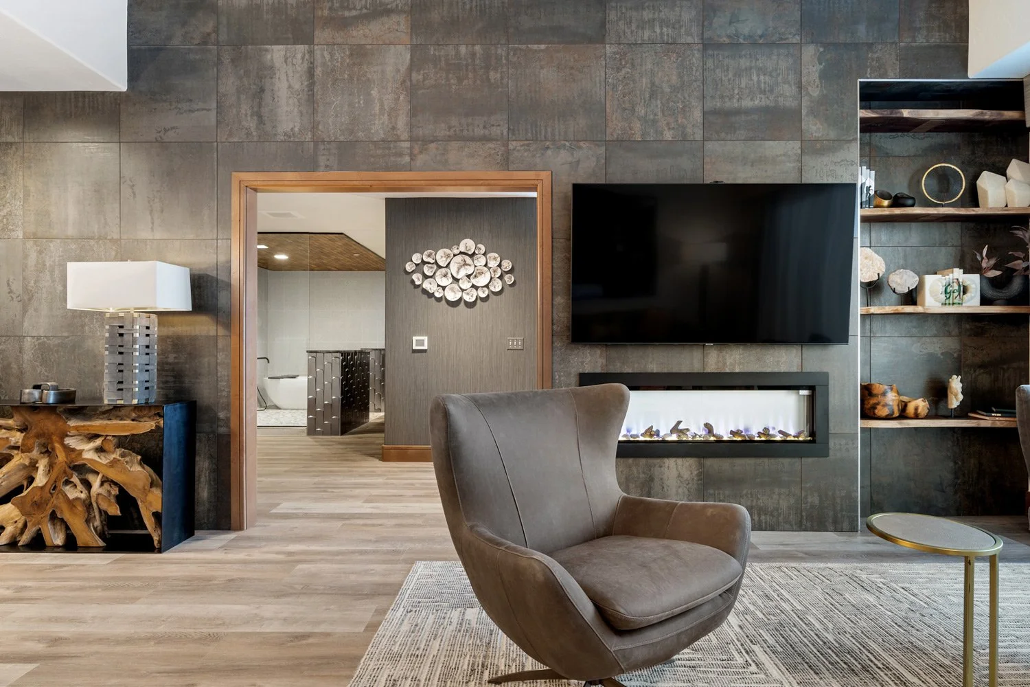 presidential suite sitting area with fireplace and flat screen tv