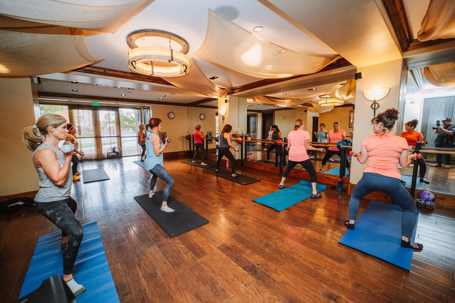 participants in a studio doing a fitness class