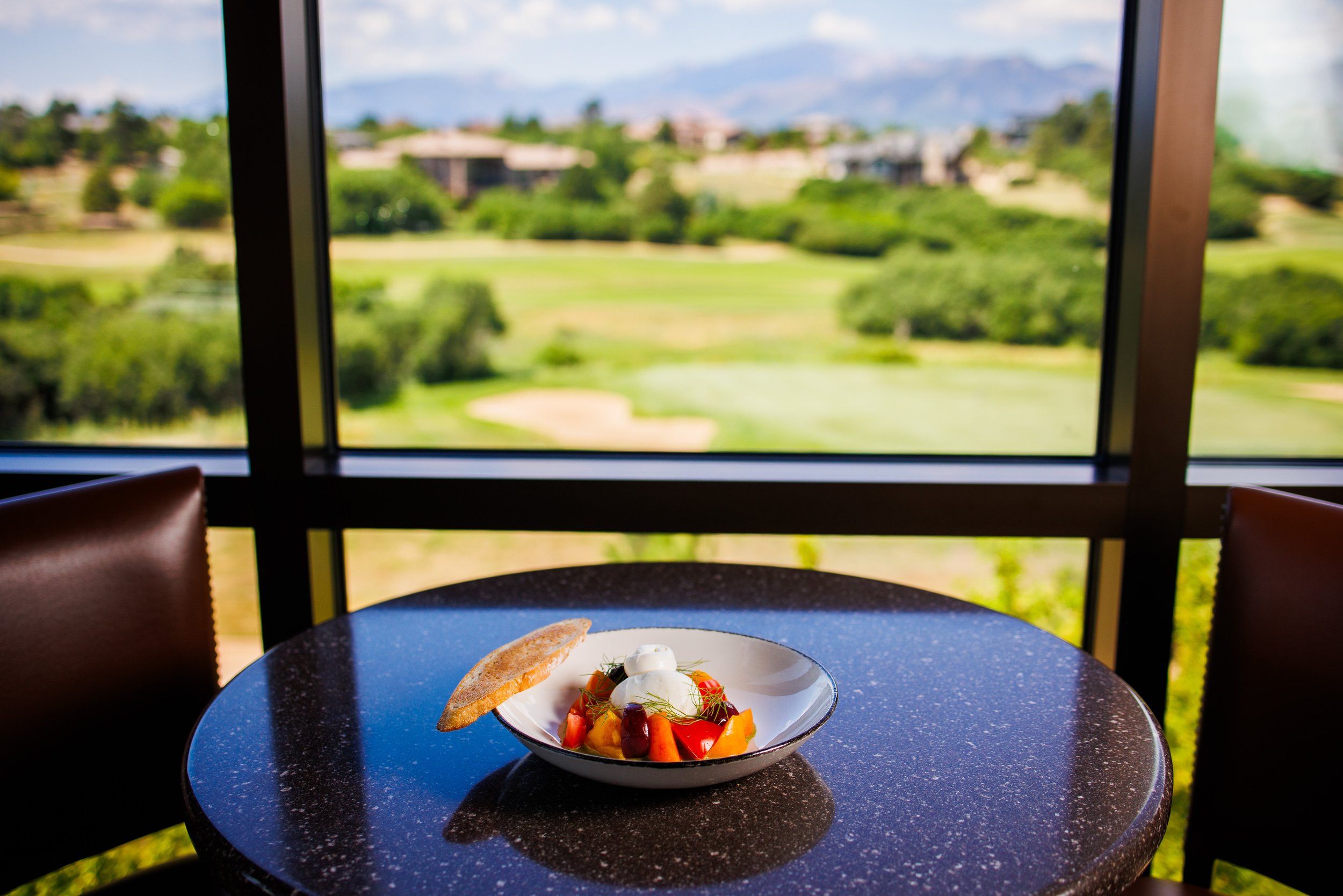 summer salad with a view at the steakhouse at flying horse