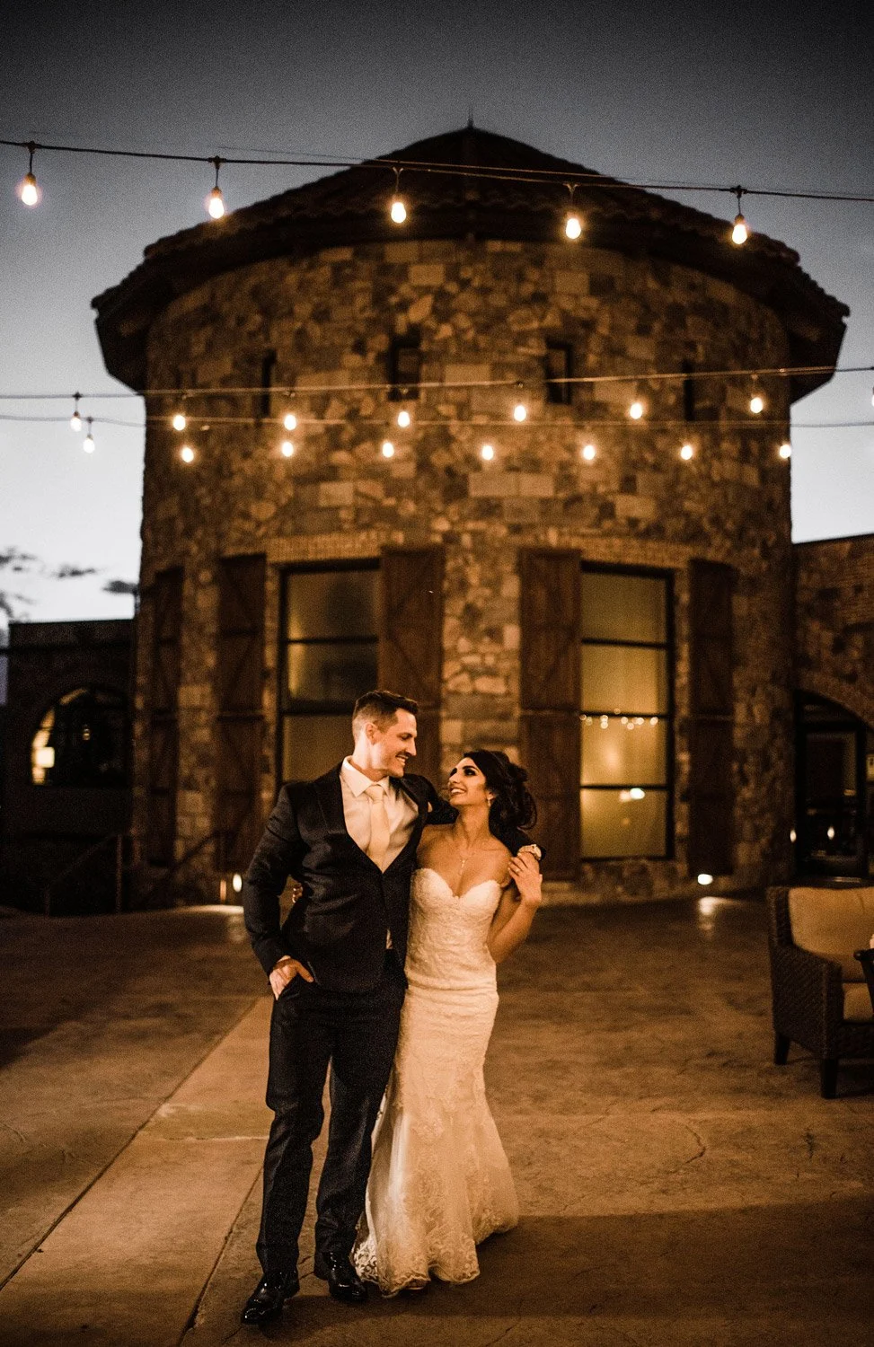 wedding resort ambiance with bistro lights and wine tower
