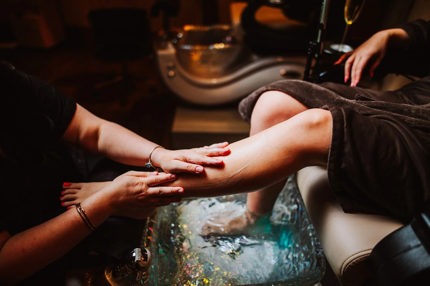 woman getting a pedicure at the spa 