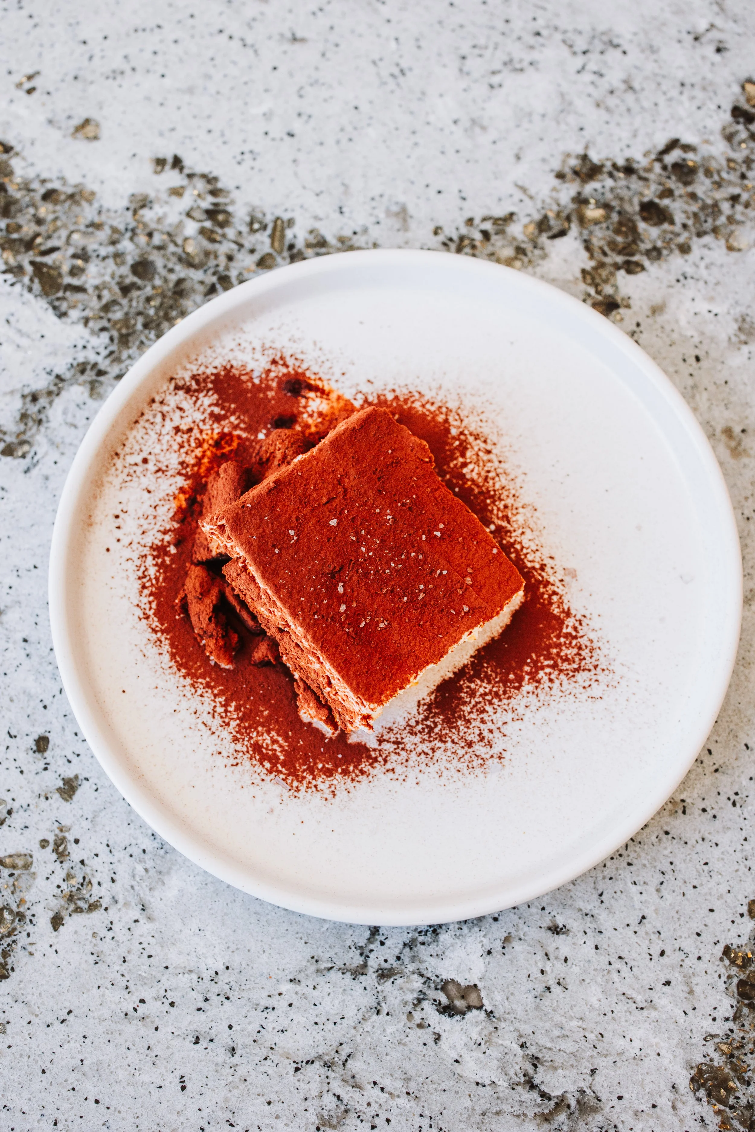 Tiramisu - espresso-soaked ladyfingers, whipped mascarpone cream, cocoa powder, maldon salt