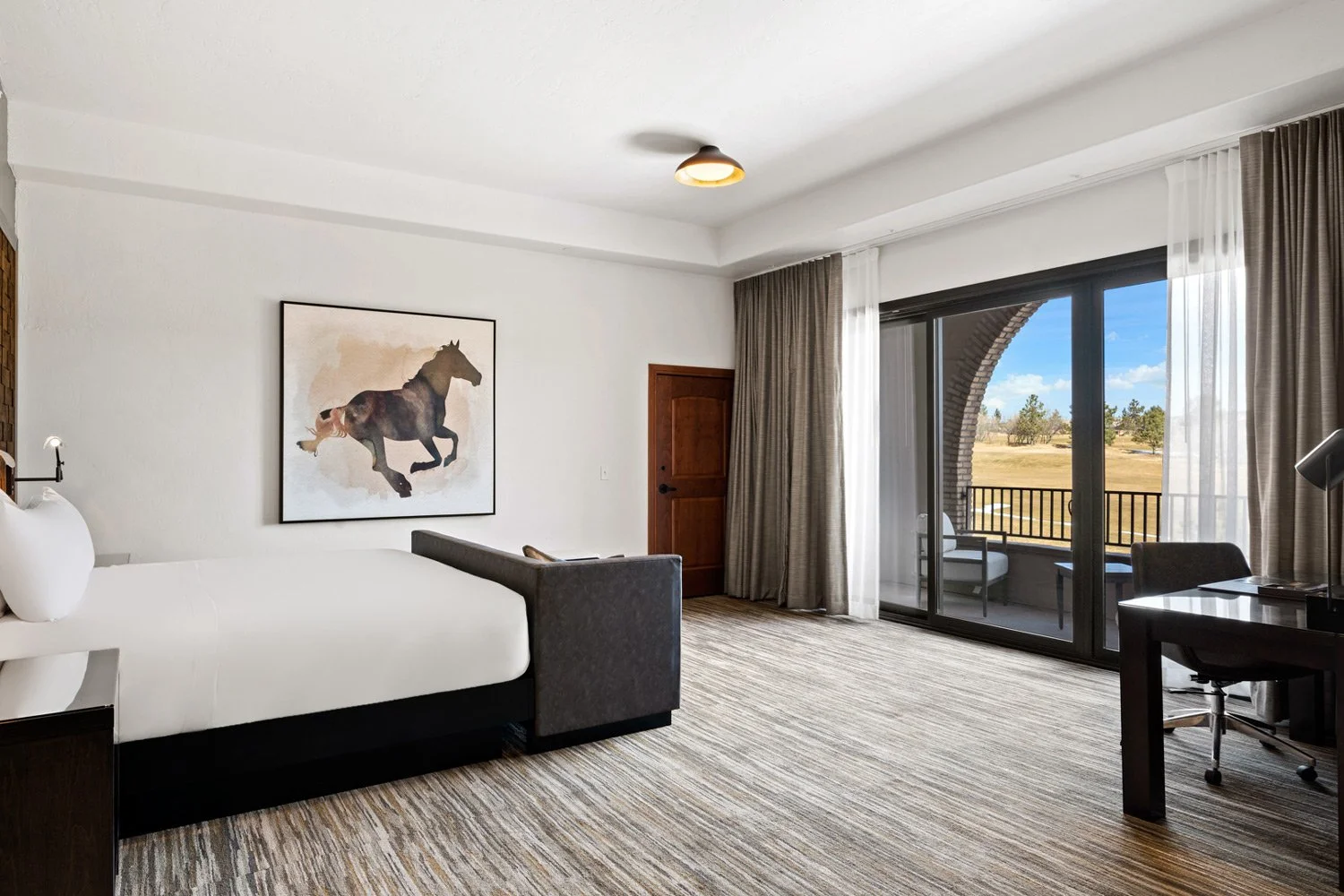 king guestroom with private balcony